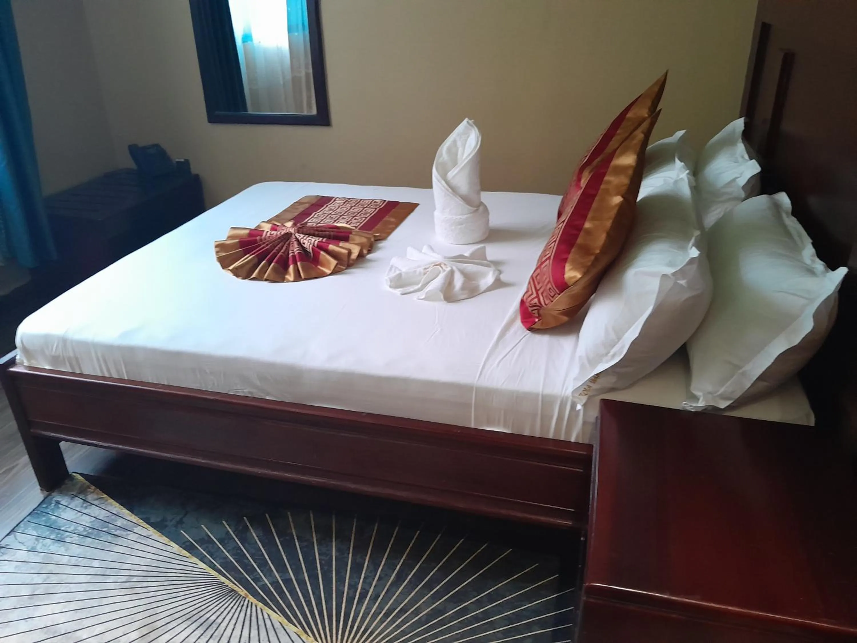 Bed in Mazola Diamond Hotel