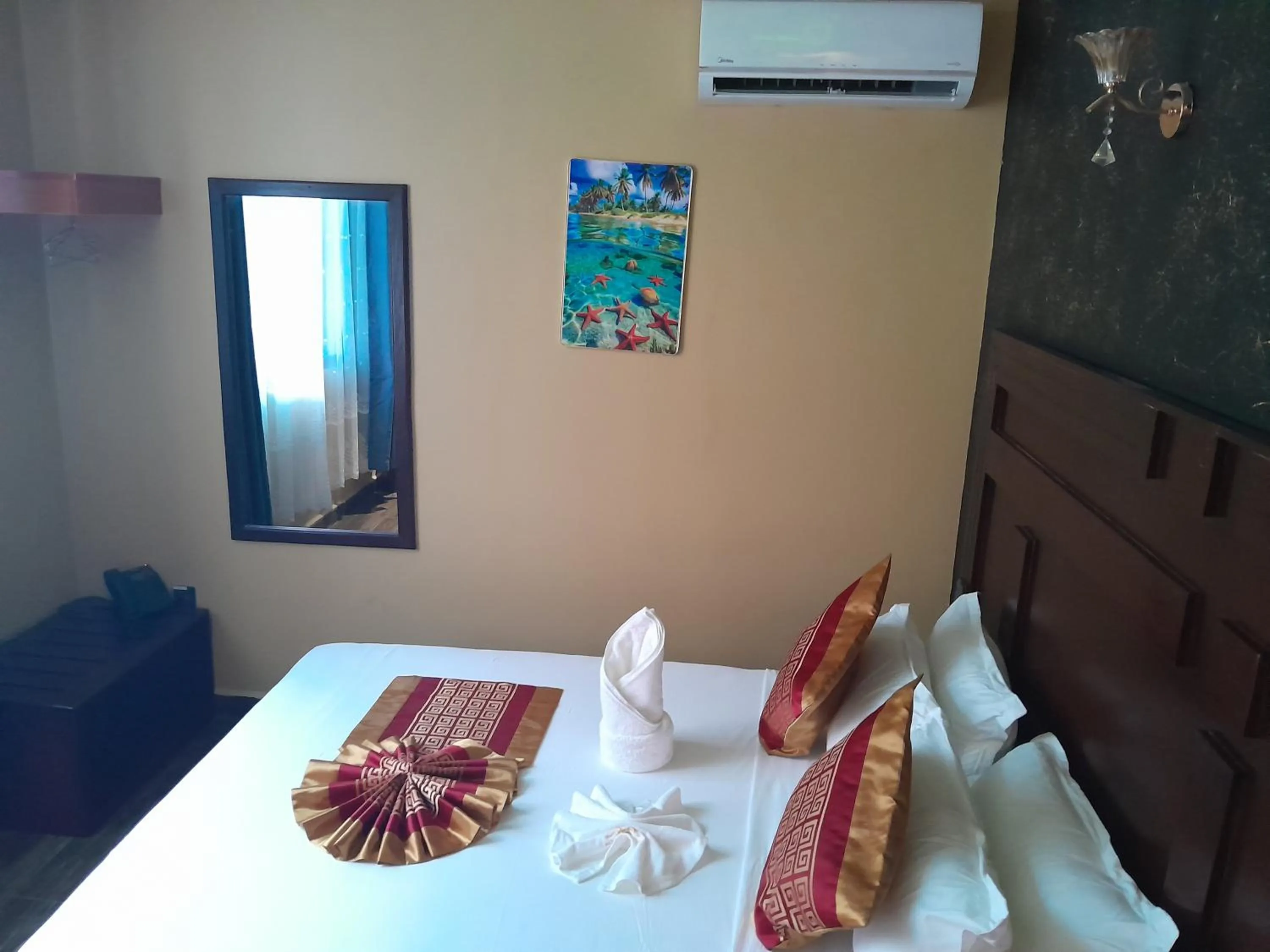 Bed in Mazola Diamond Hotel