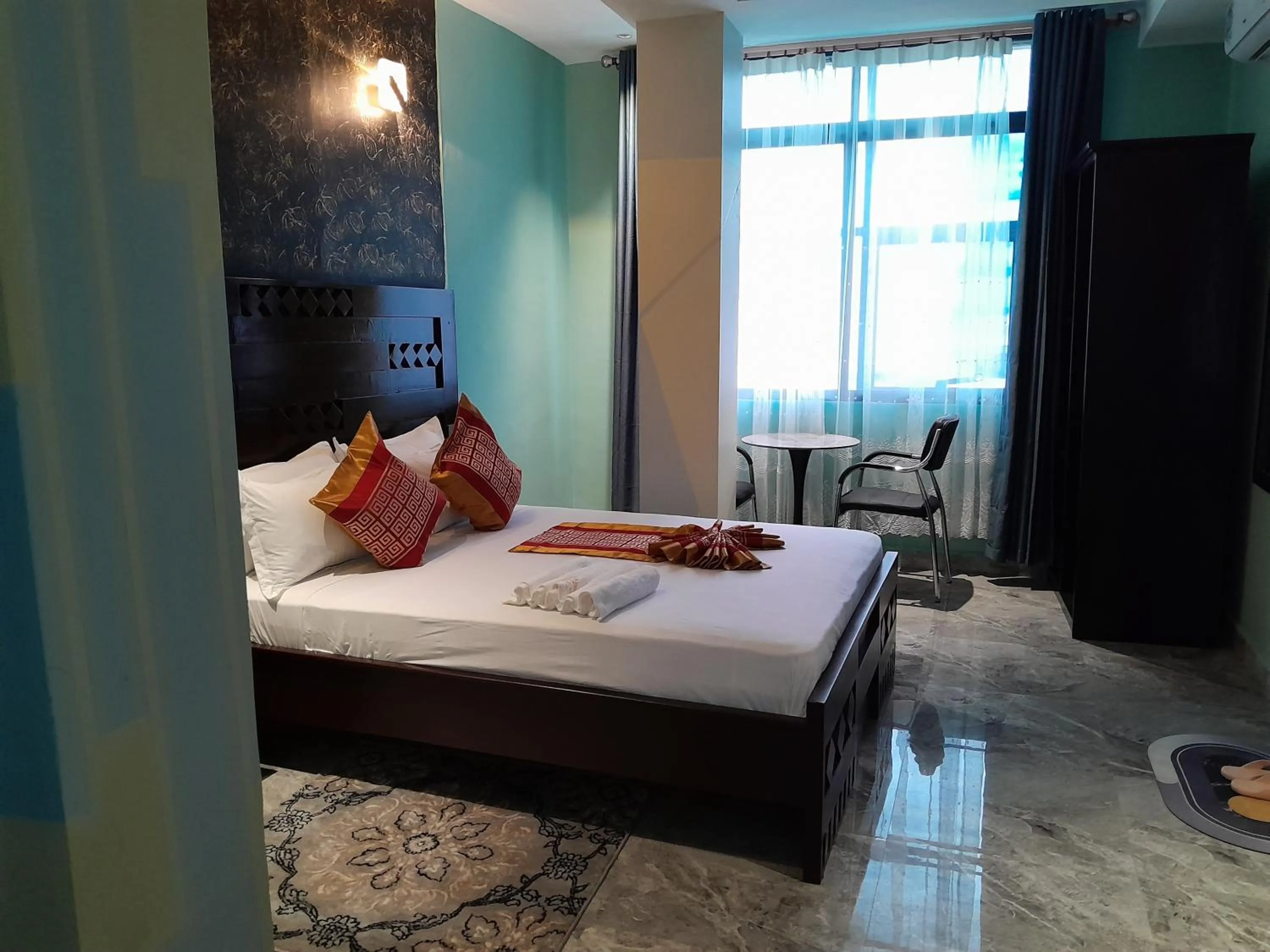 Bed in Mazola Diamond Hotel