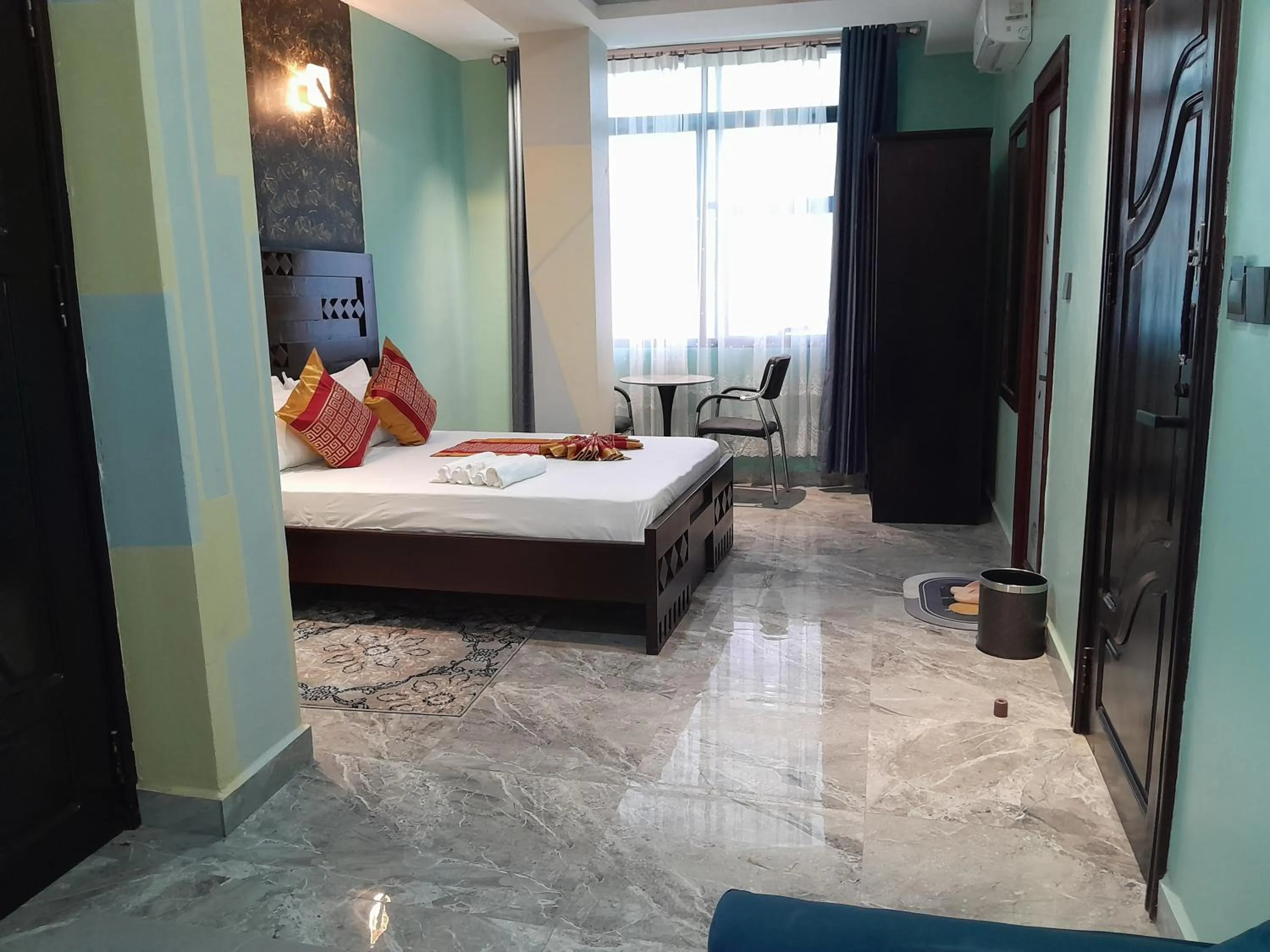 Bed in Mazola Diamond Hotel