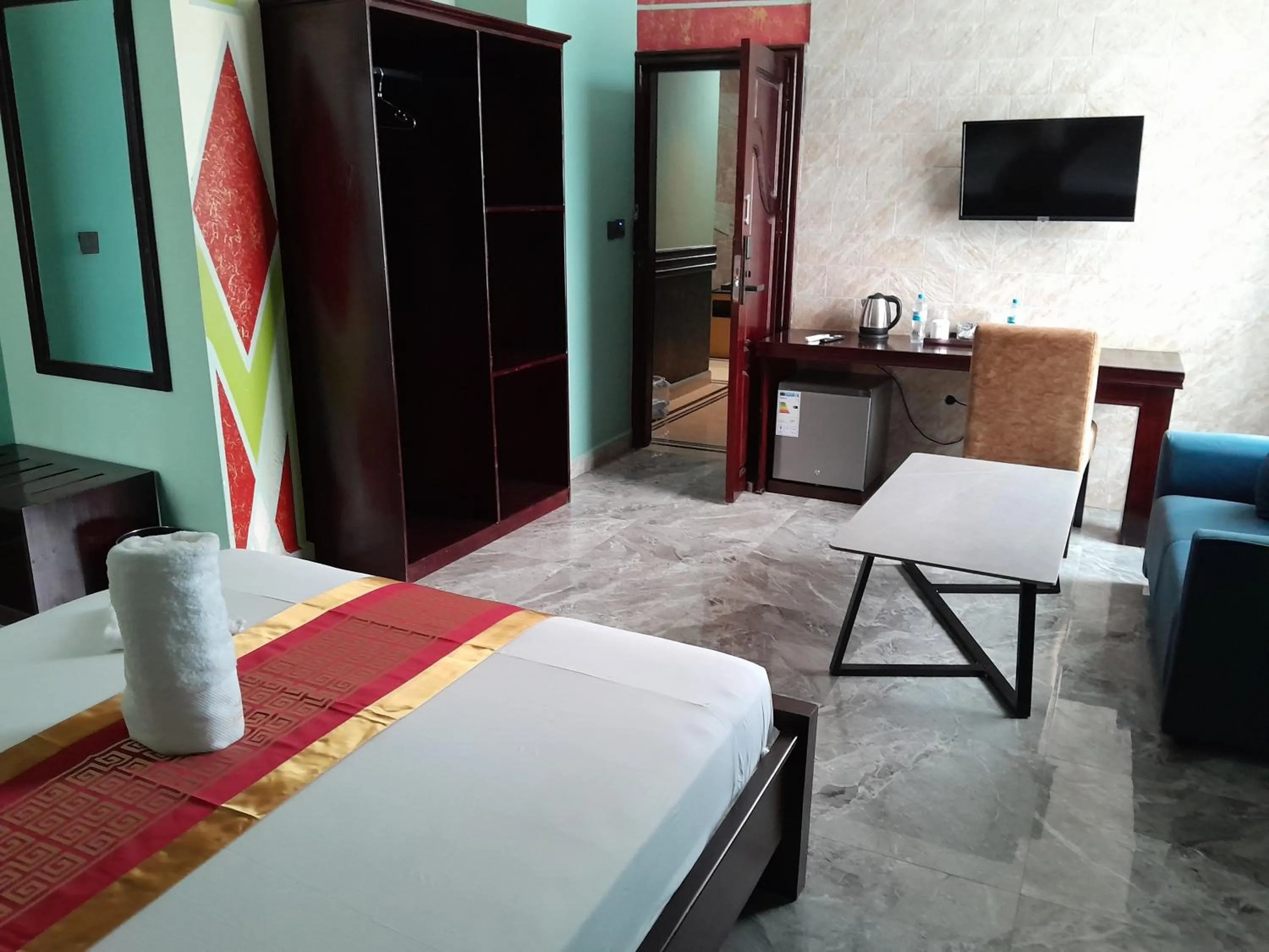 Bed in Mazola Diamond Hotel