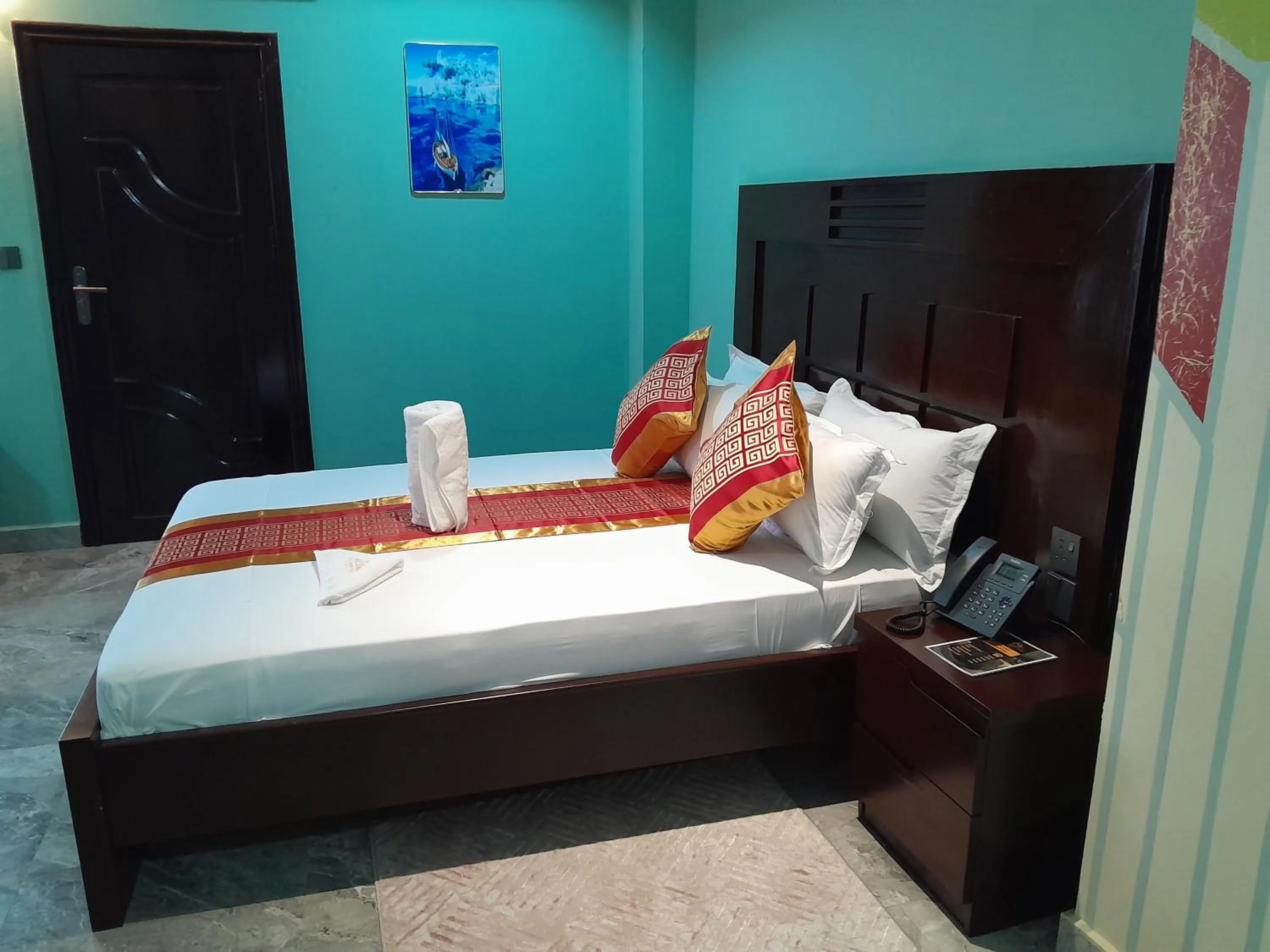 Bed in Mazola Diamond Hotel