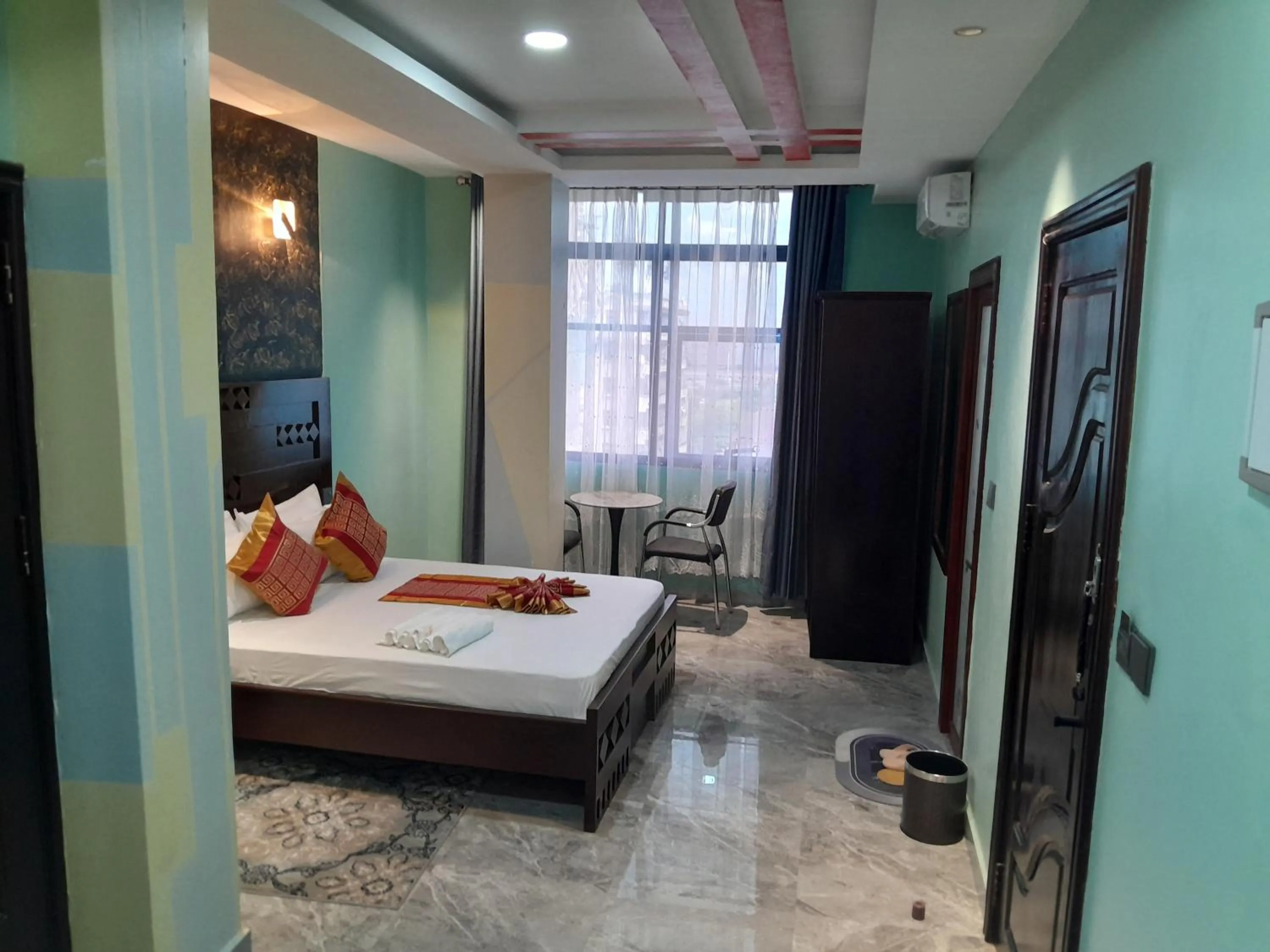 Bed in Mazola Diamond Hotel