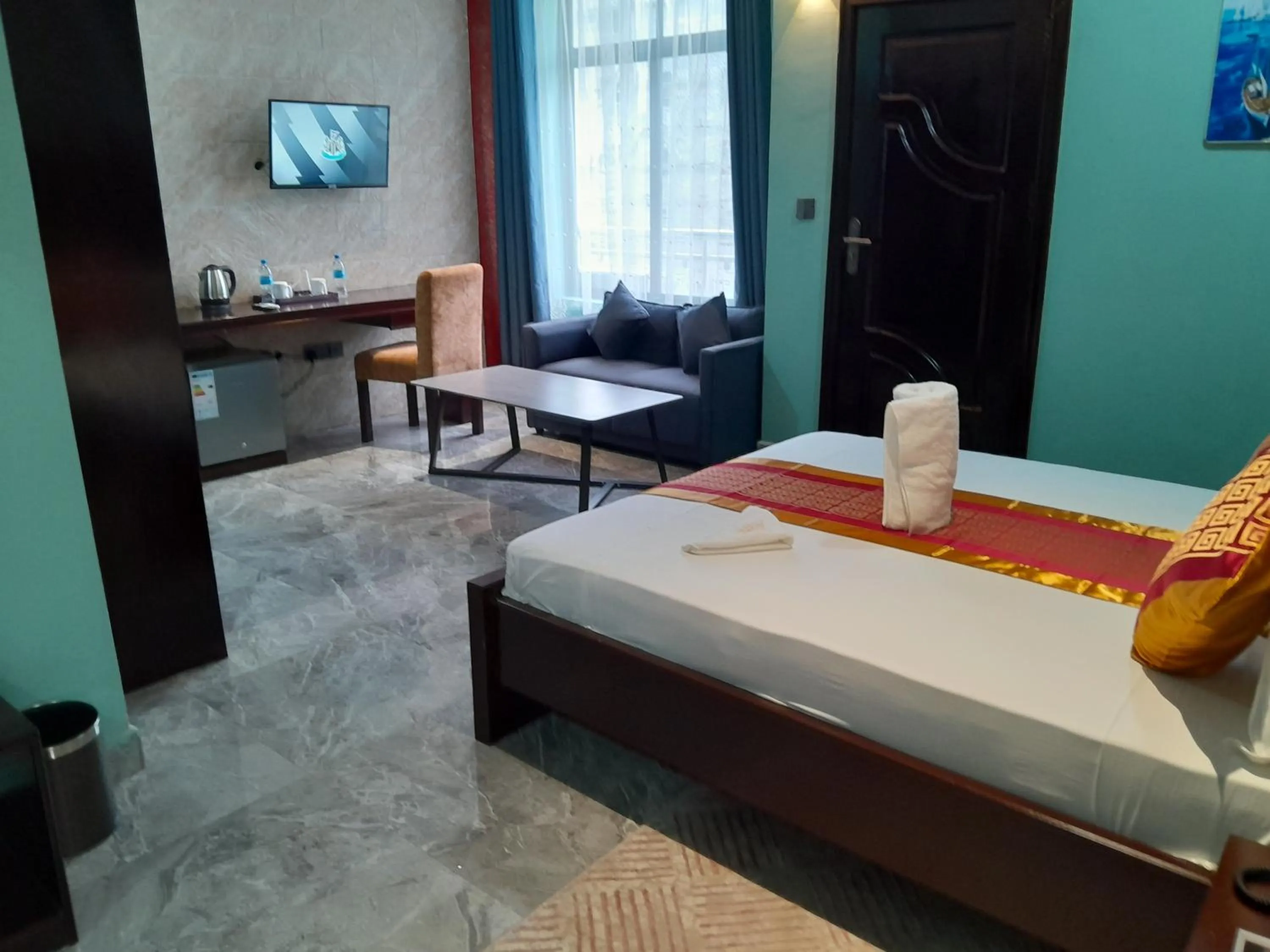 Bed in Mazola Diamond Hotel