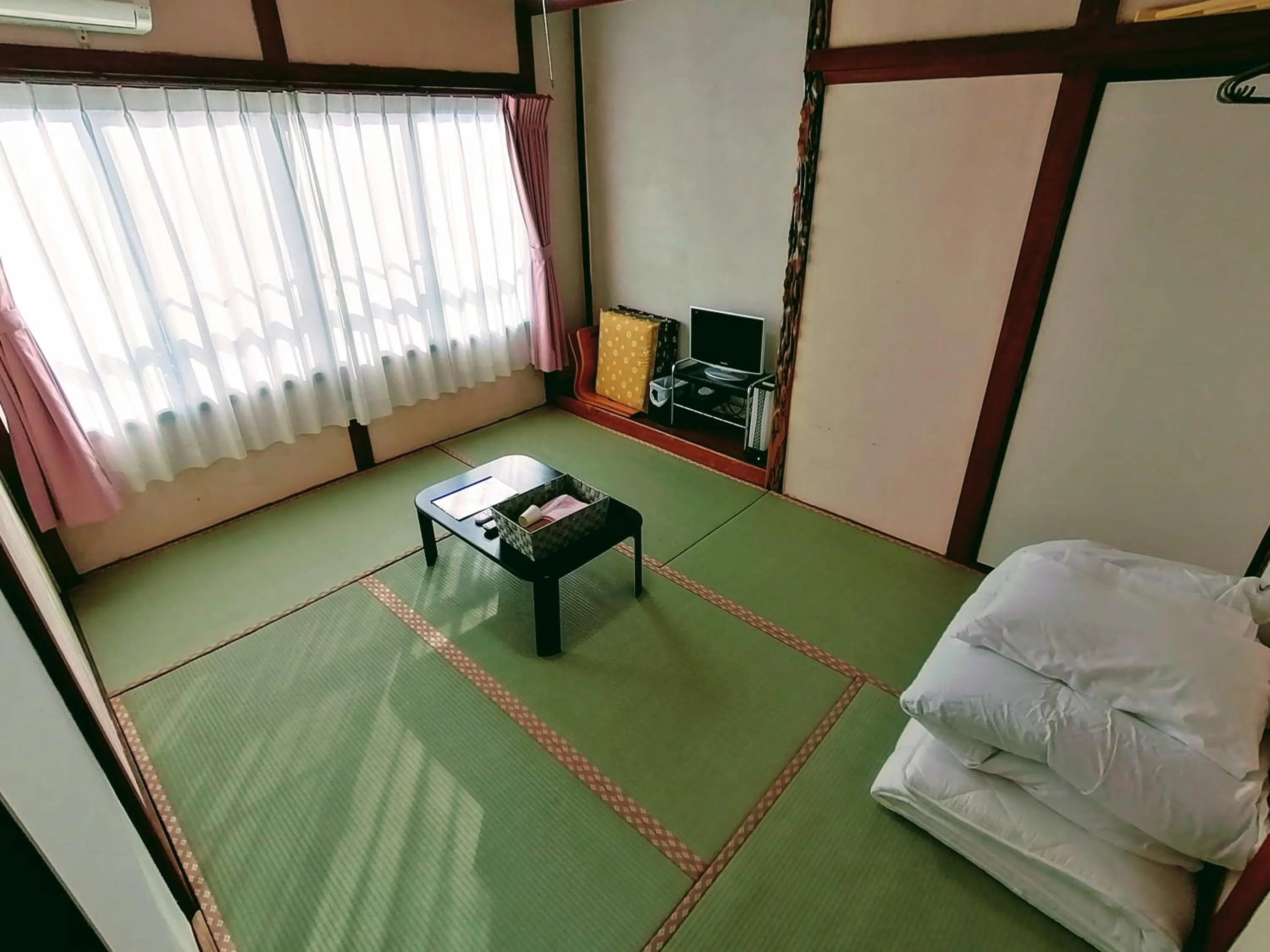 Bed in Takachiho B&B Ukigumo