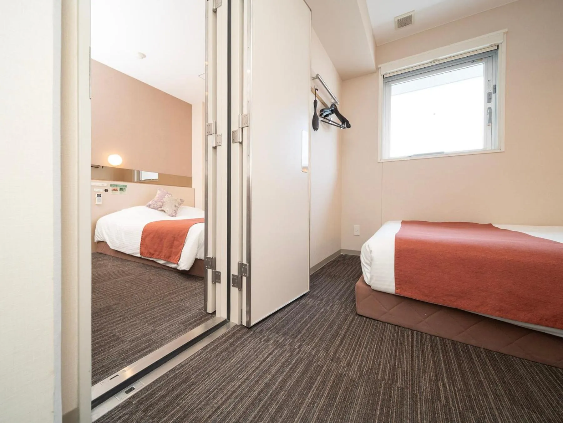 Bed in Super Hotel Premier Akasaka