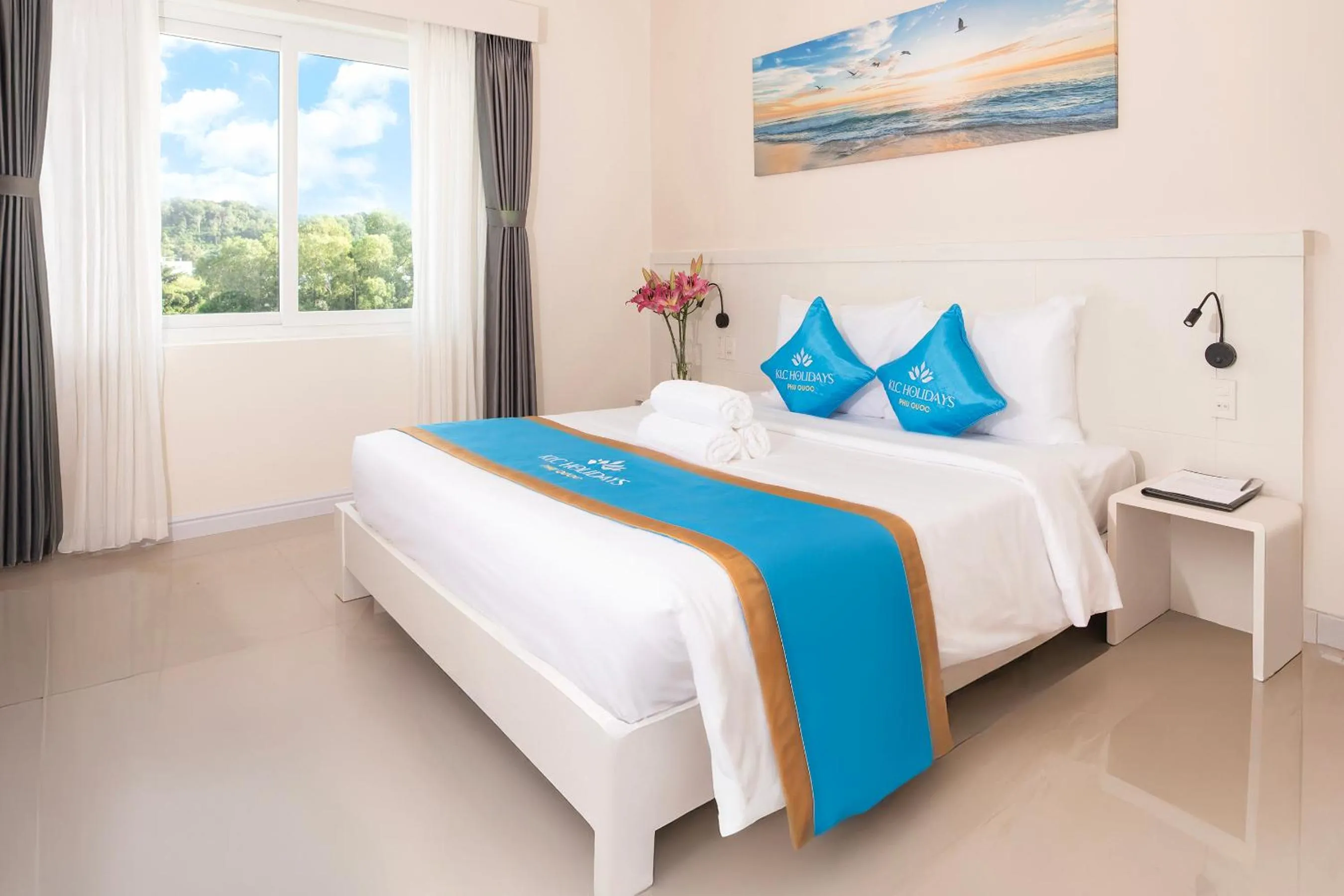 Bed in KLC Holidays Phu Quoc Hotel