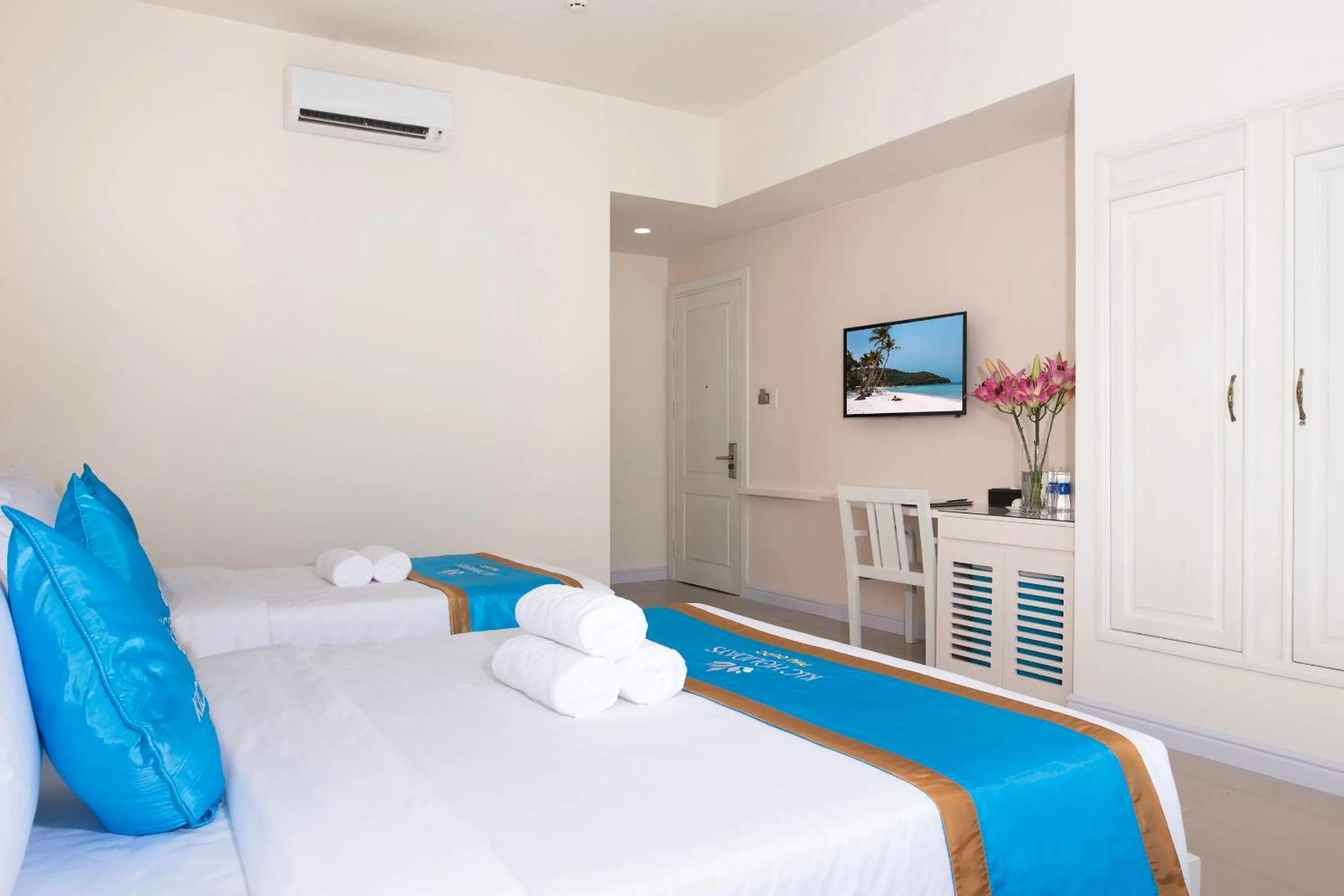 Bed in KLC Holidays Phu Quoc Hotel
