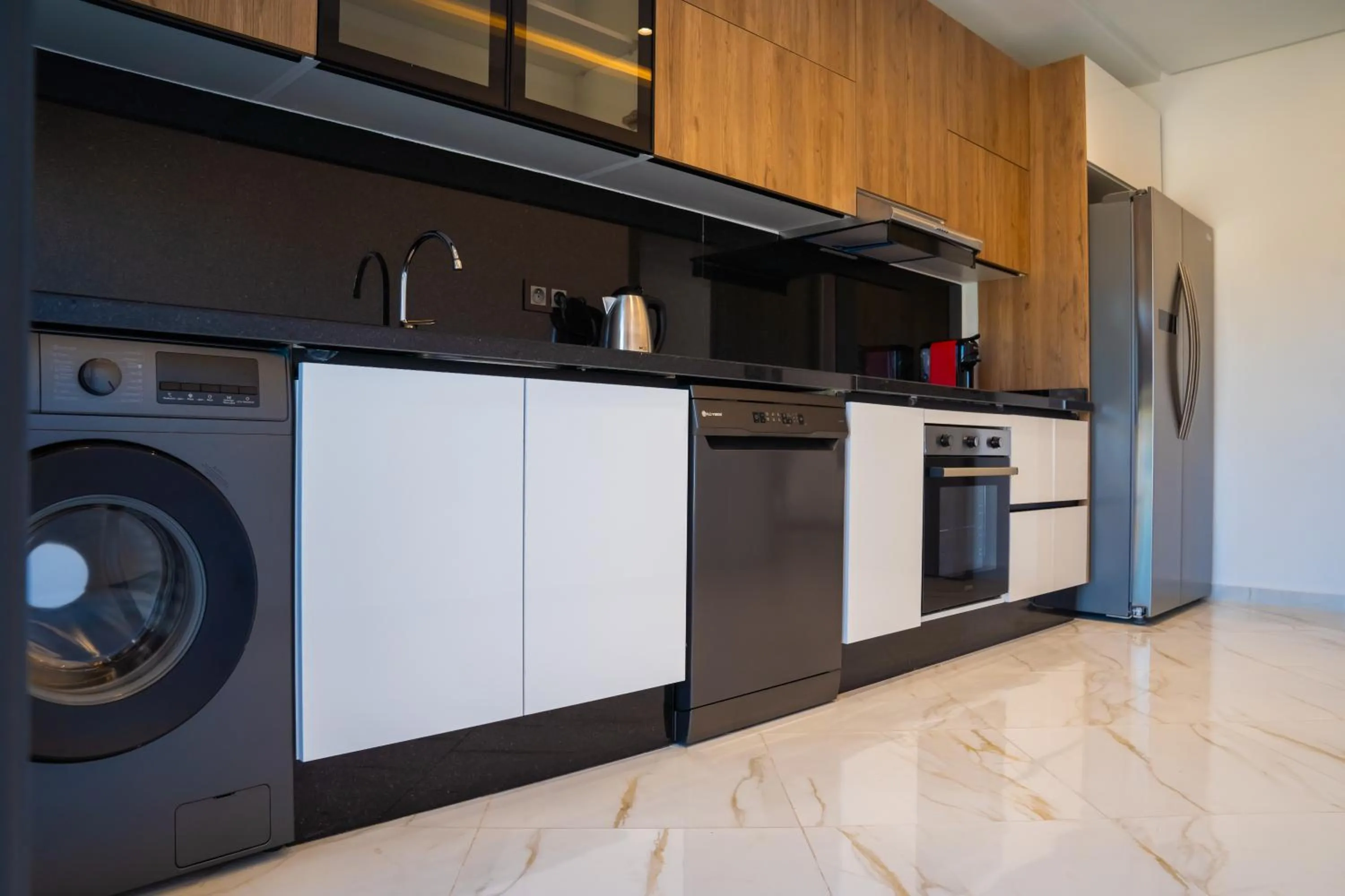 Kitchen or kitchenette in Amelia Appart-Hotel