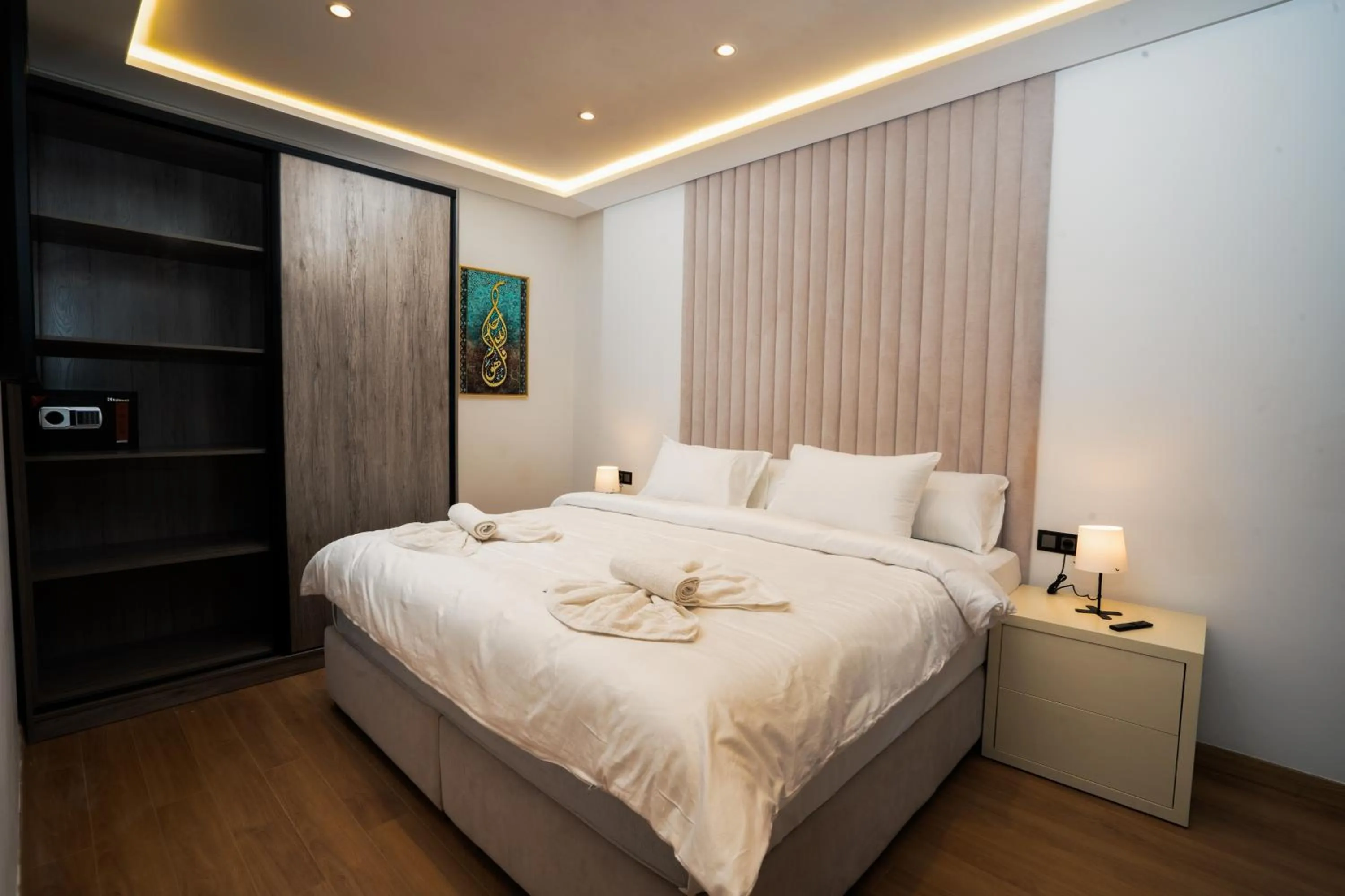 Bed in Amelia Appart-Hotel