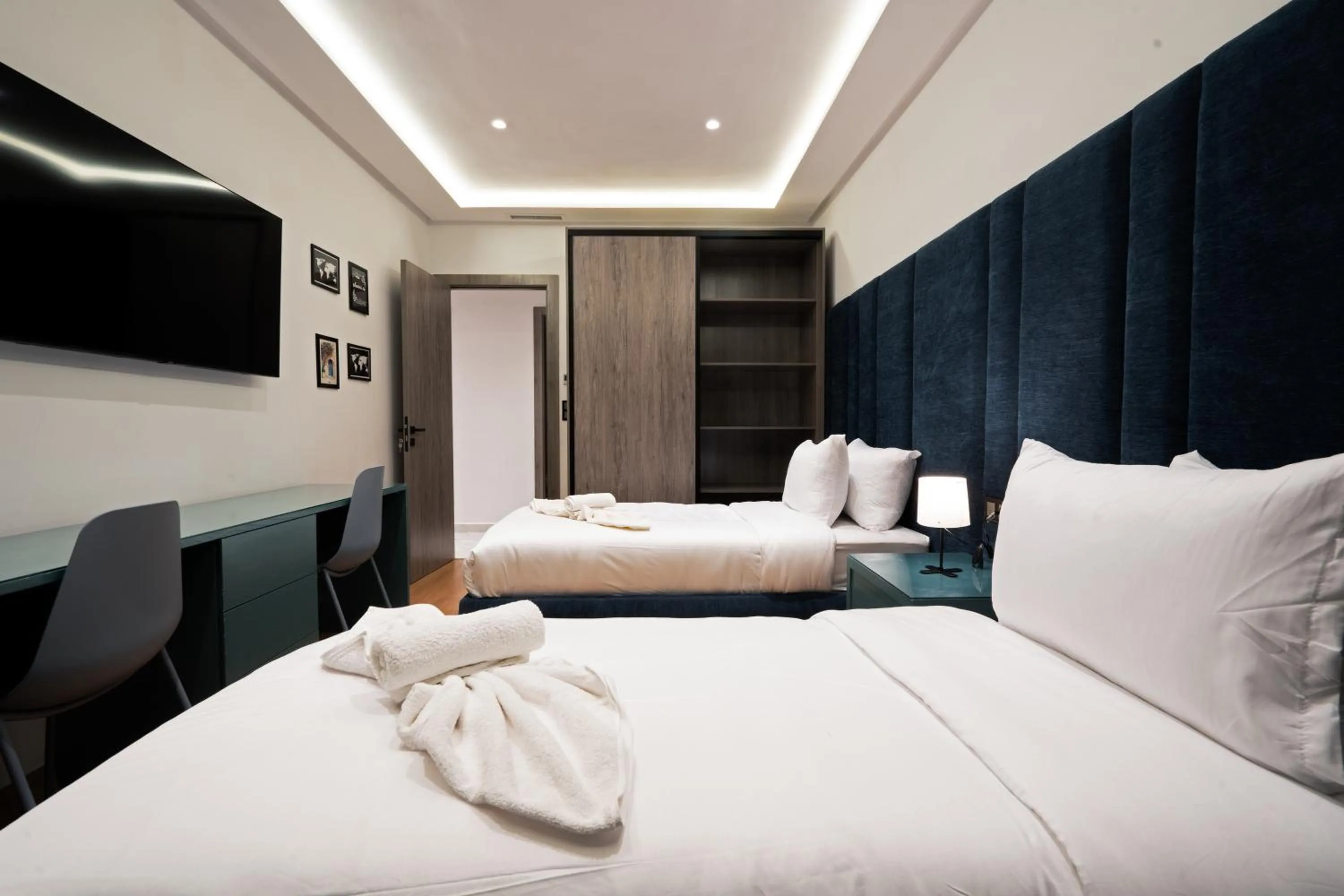 Bed in Amelia Appart-Hotel