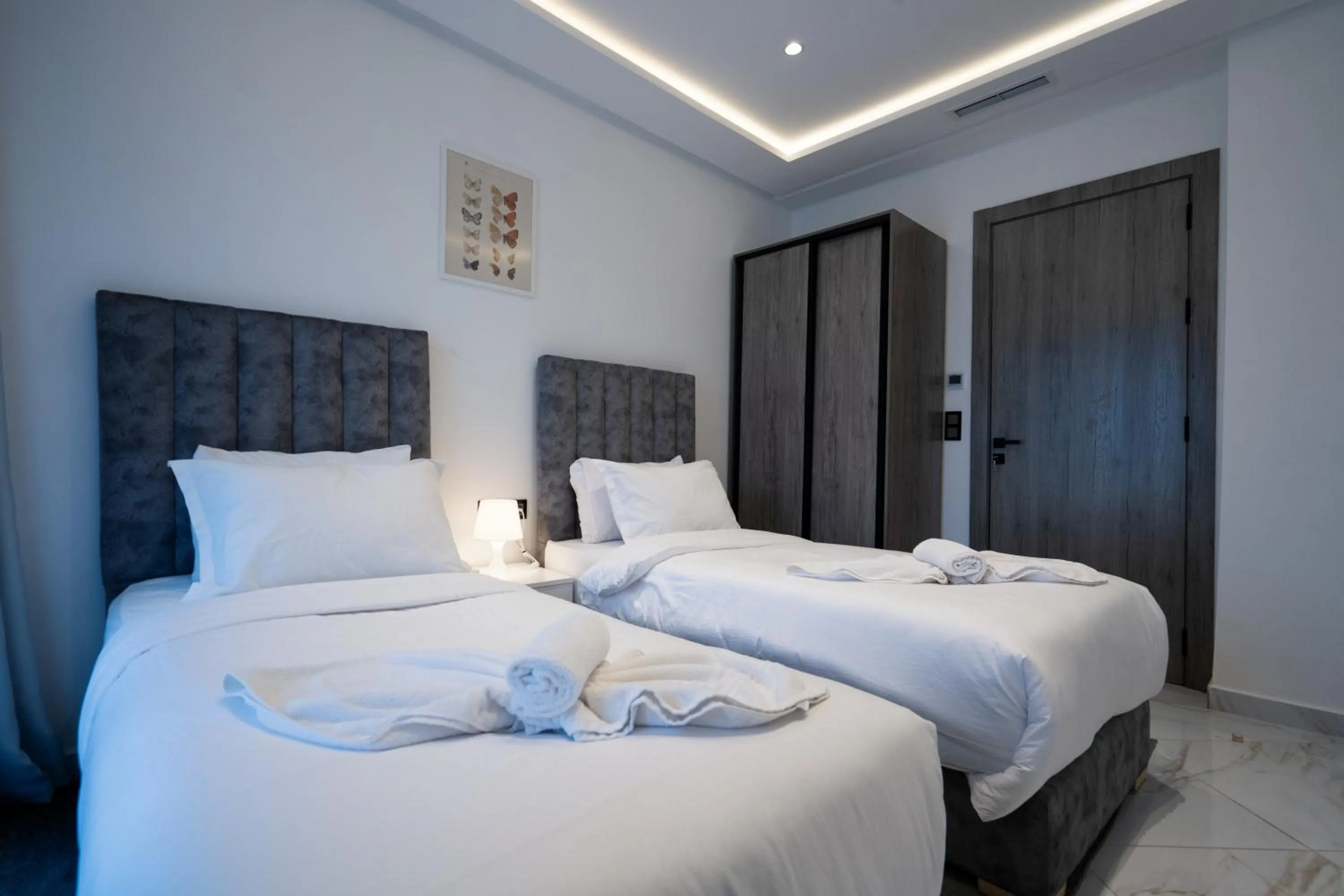 Bed in Amelia Appart-Hotel