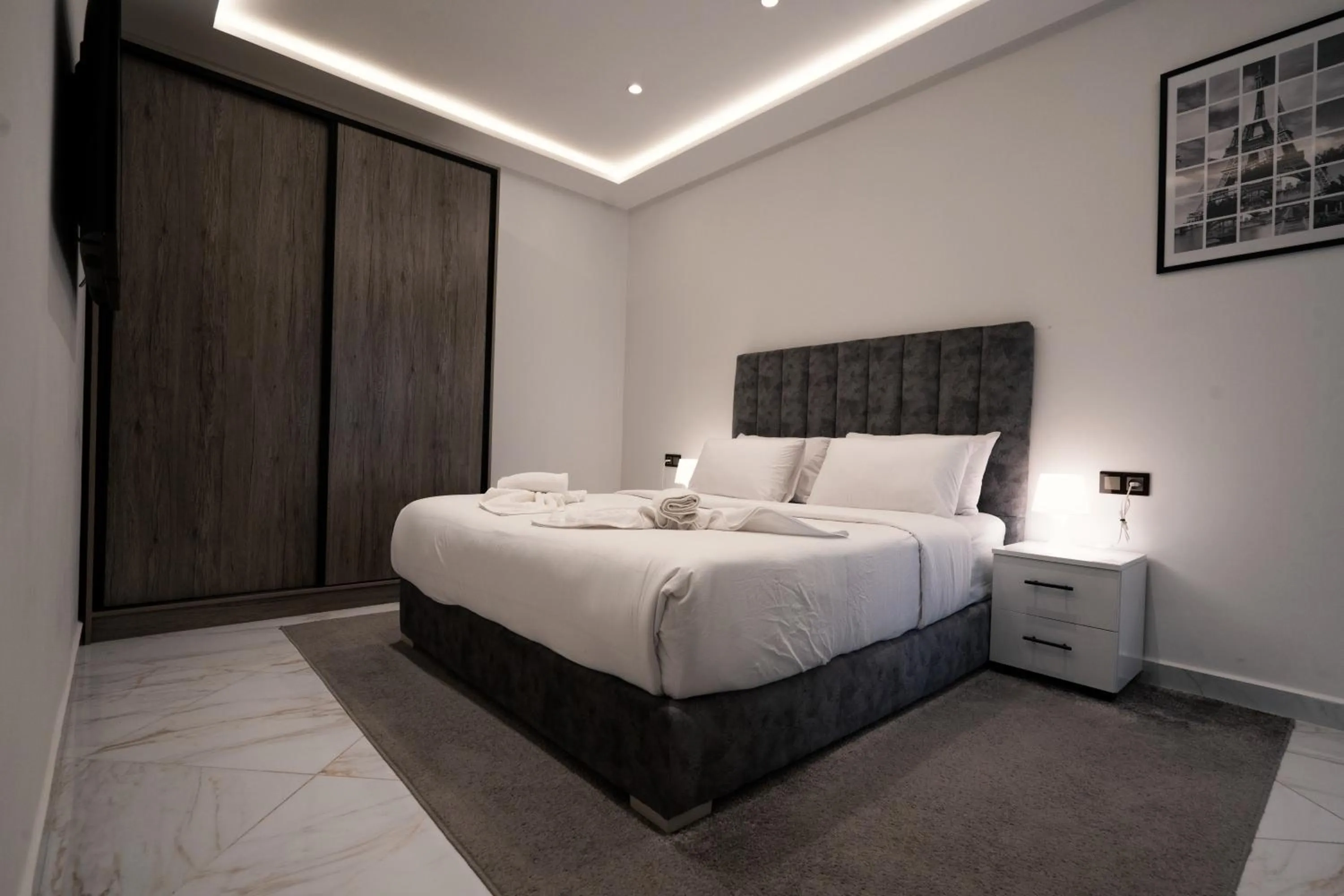 Bed in Amelia Appart-Hotel