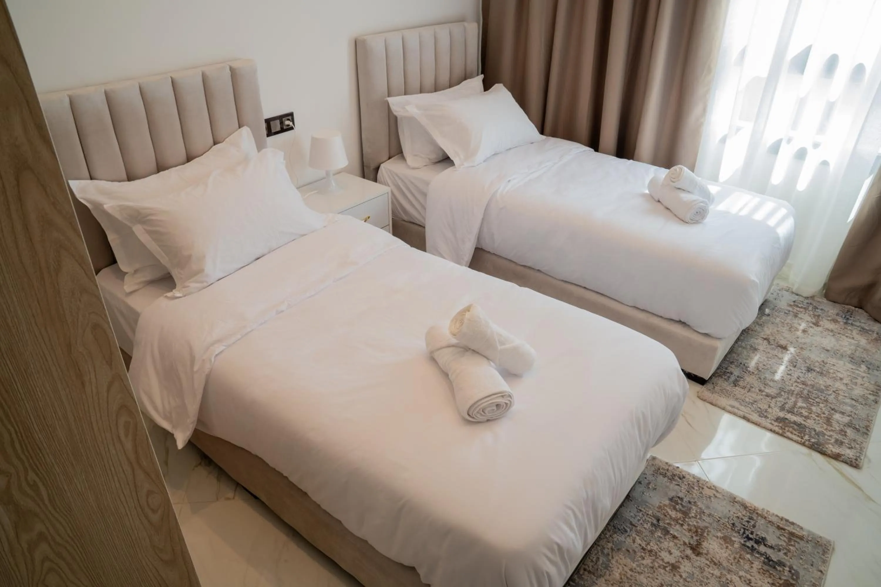 Bed in Living Appart-Hotel