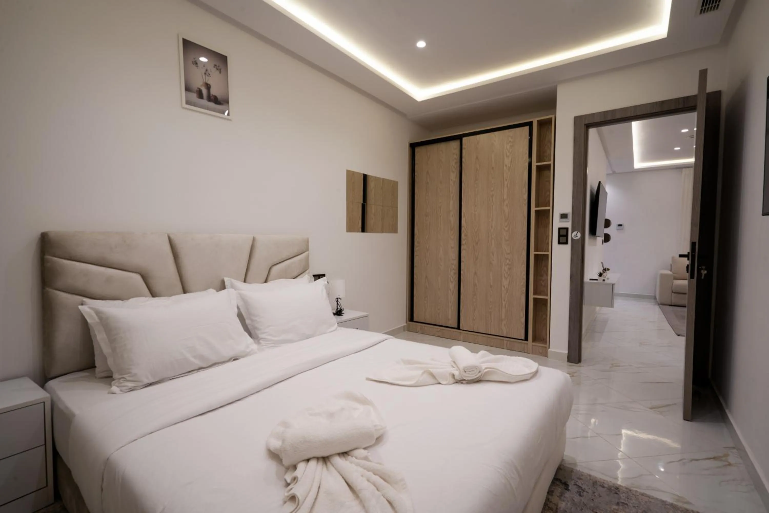 Bed in Living Appart-Hotel