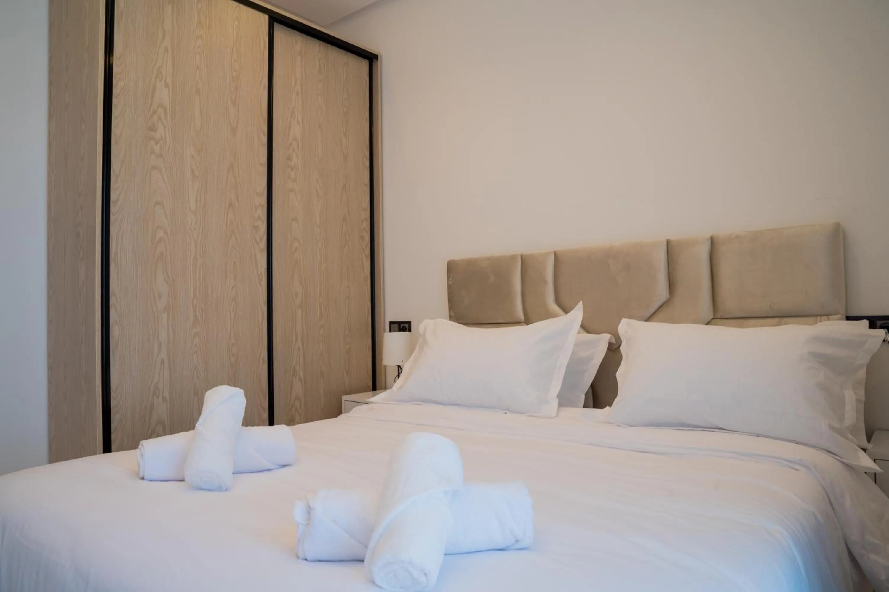 Bed in Living Appart-Hotel