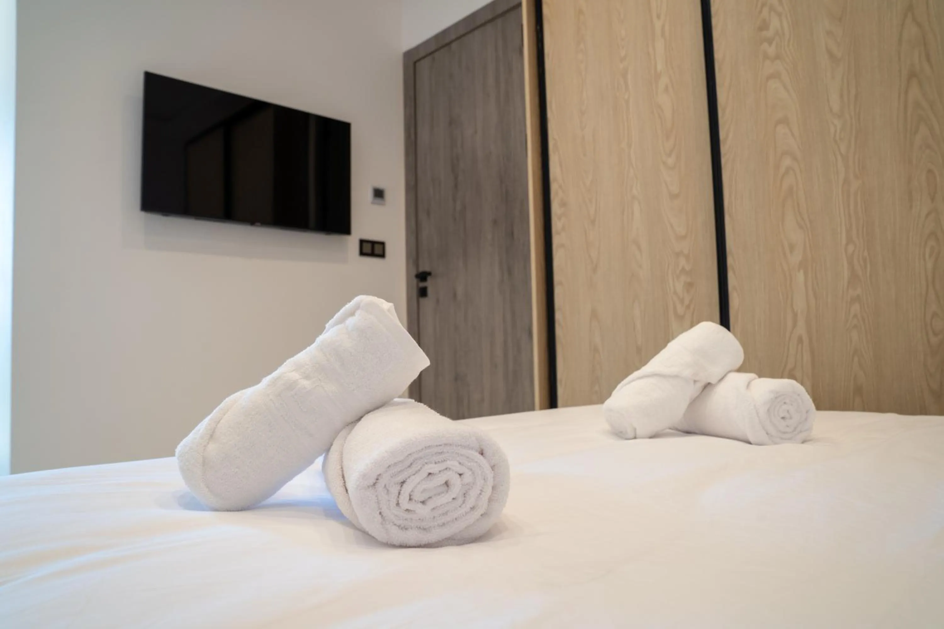 Bed in Living Appart-Hotel