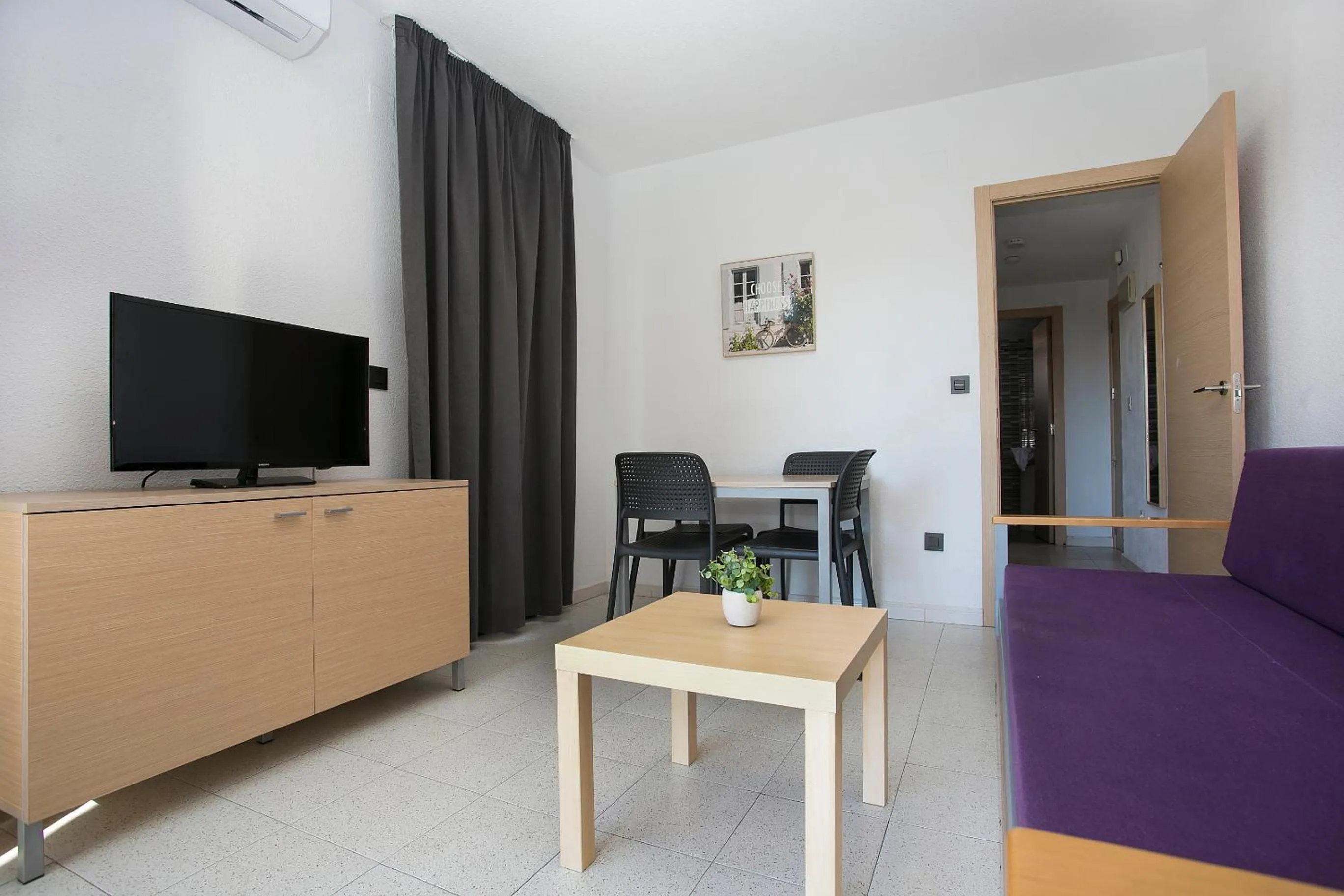 Living room in Apartamentos Amalia By Mc