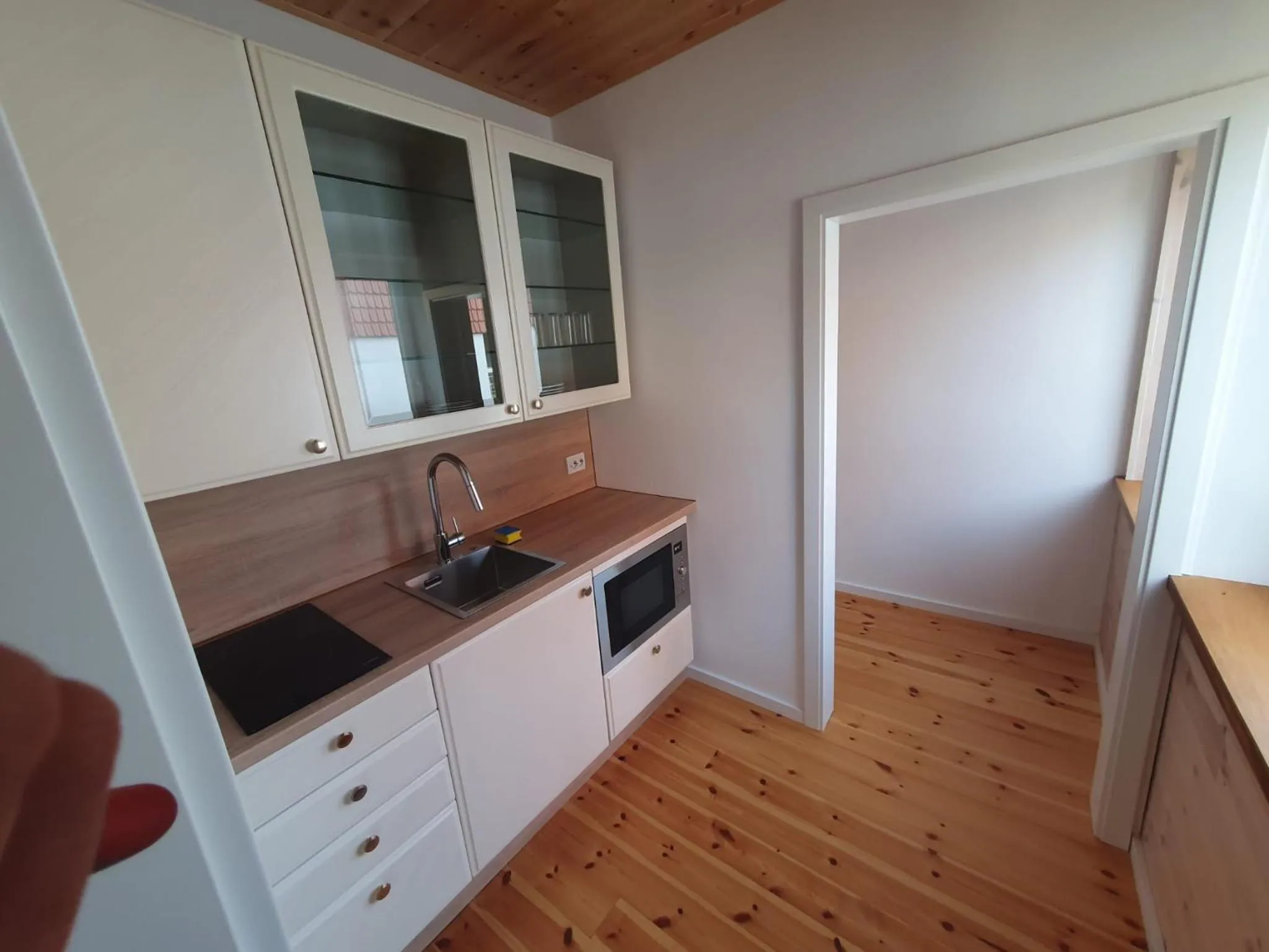 Kitchen or kitchenette in Hotel garni Zum Reinhardswald