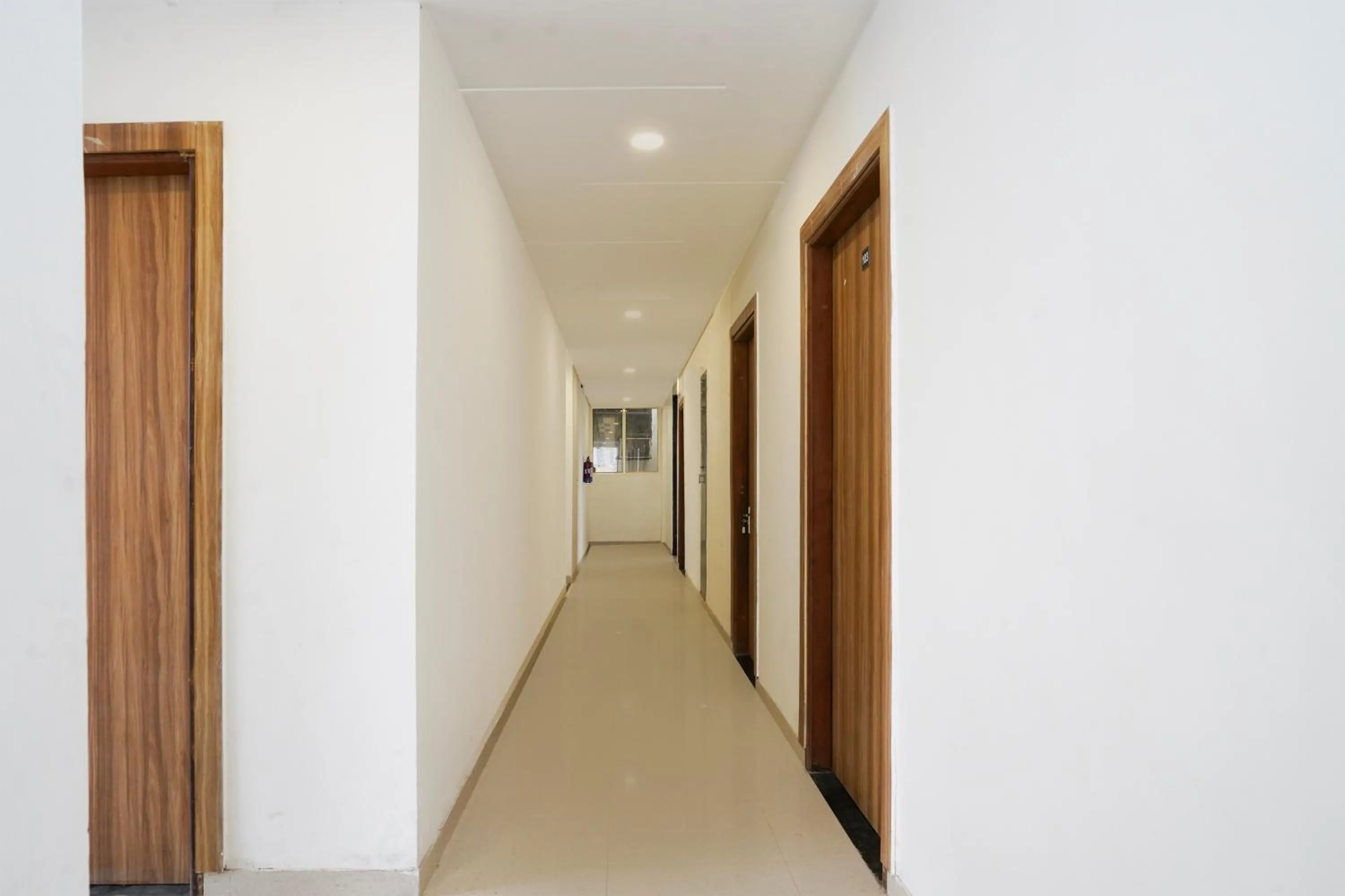 Hotel O Noida Sky Suites Sector 44 Near botanical metro