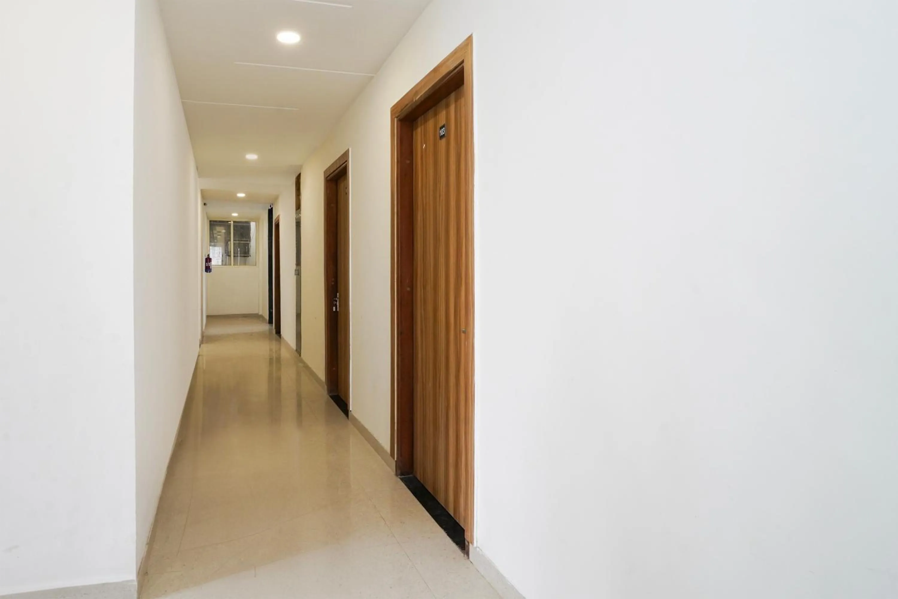 Hotel O Noida Sky Suites Sector 44 Near botanical metro