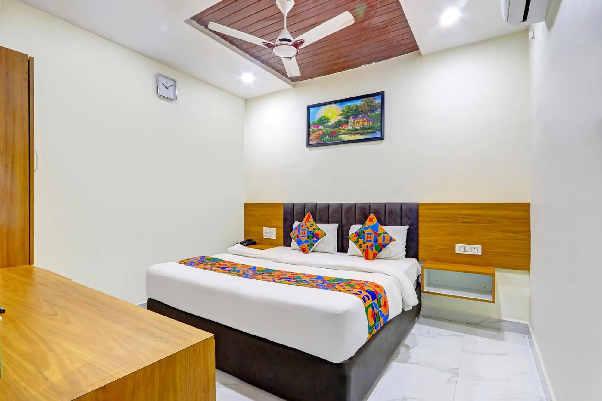 Bed in FabHotel Dharani Grand - Nr Mamata Medical College
