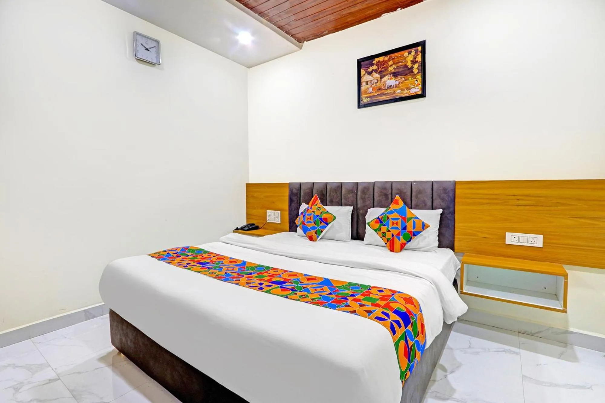 Bed in FabHotel Dharani Grand - Nr Mamata Medical College