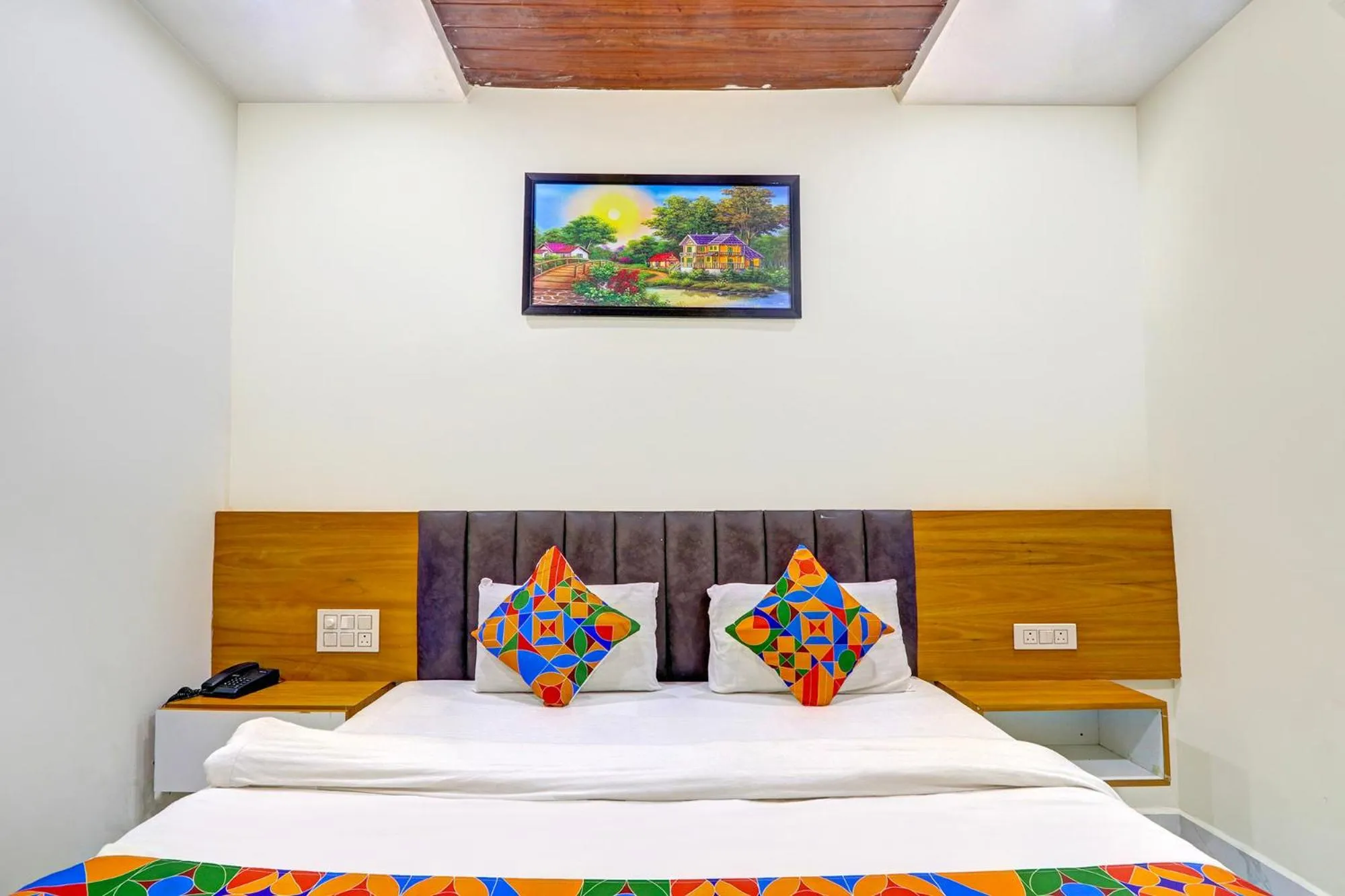 Bed in FabHotel Dharani Grand - Nr Mamata Medical College