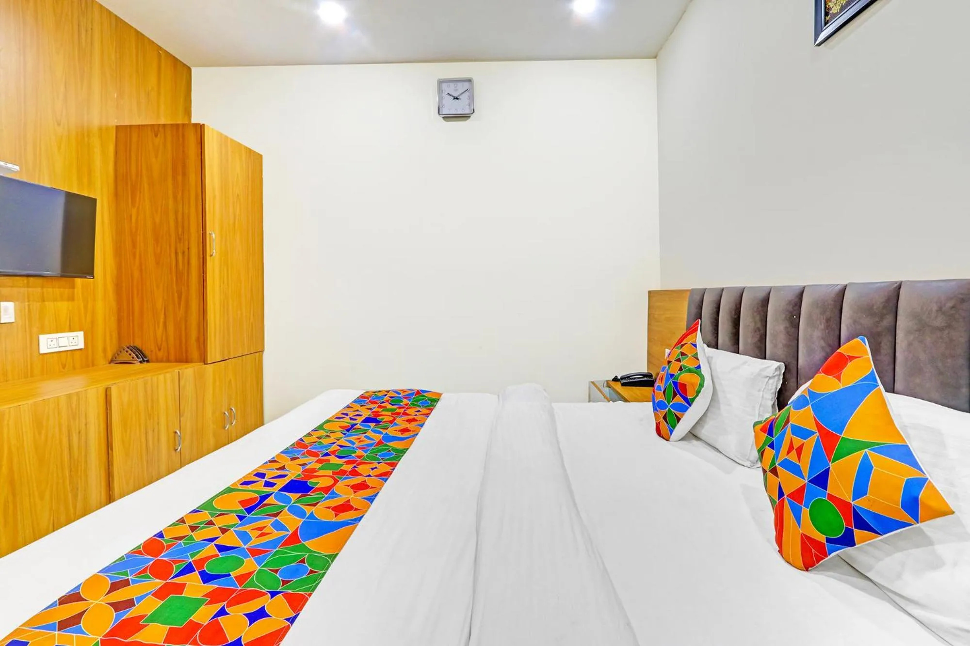 Bed in FabHotel Dharani Grand - Nr Mamata Medical College