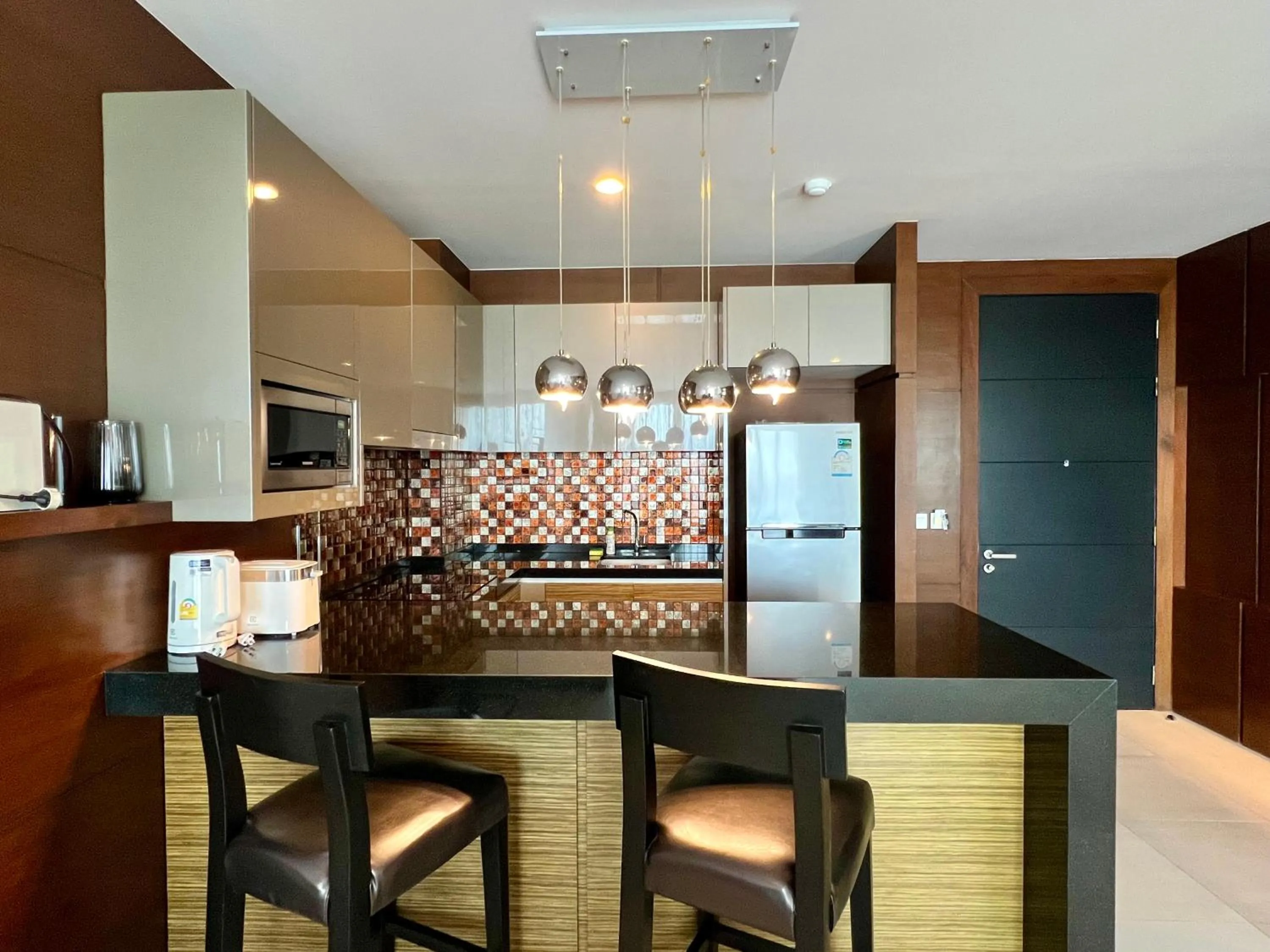 Dining area in The Regent Bangtao by RESAVA