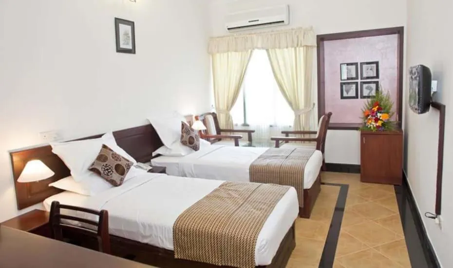 Bed in Hotel Afrad International