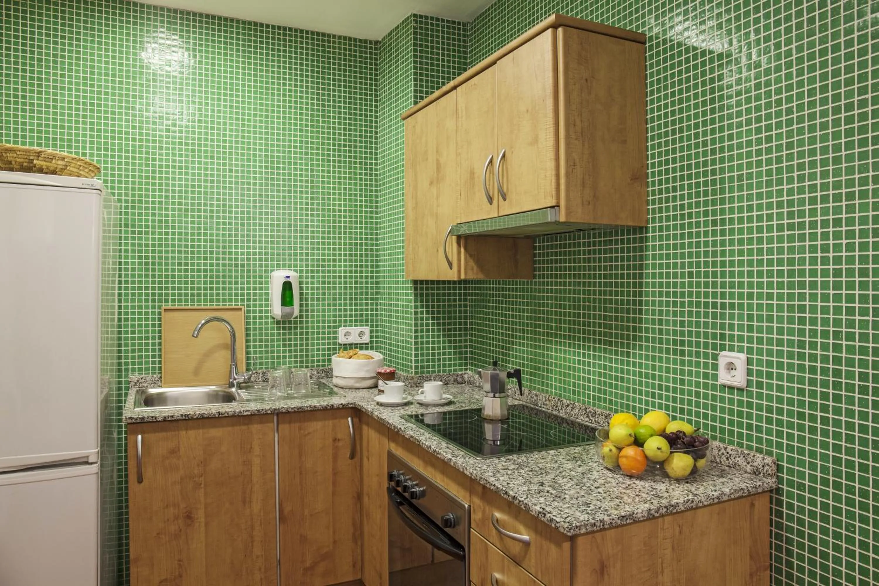 Kitchen or kitchenette in AinB Las Ramblas-Guardia Apartments