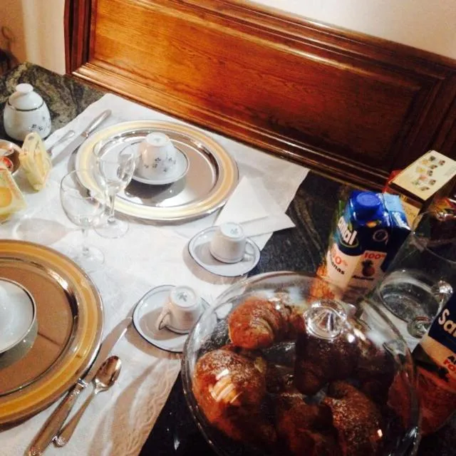 Communal lounge/ TV room in B&B Santiago