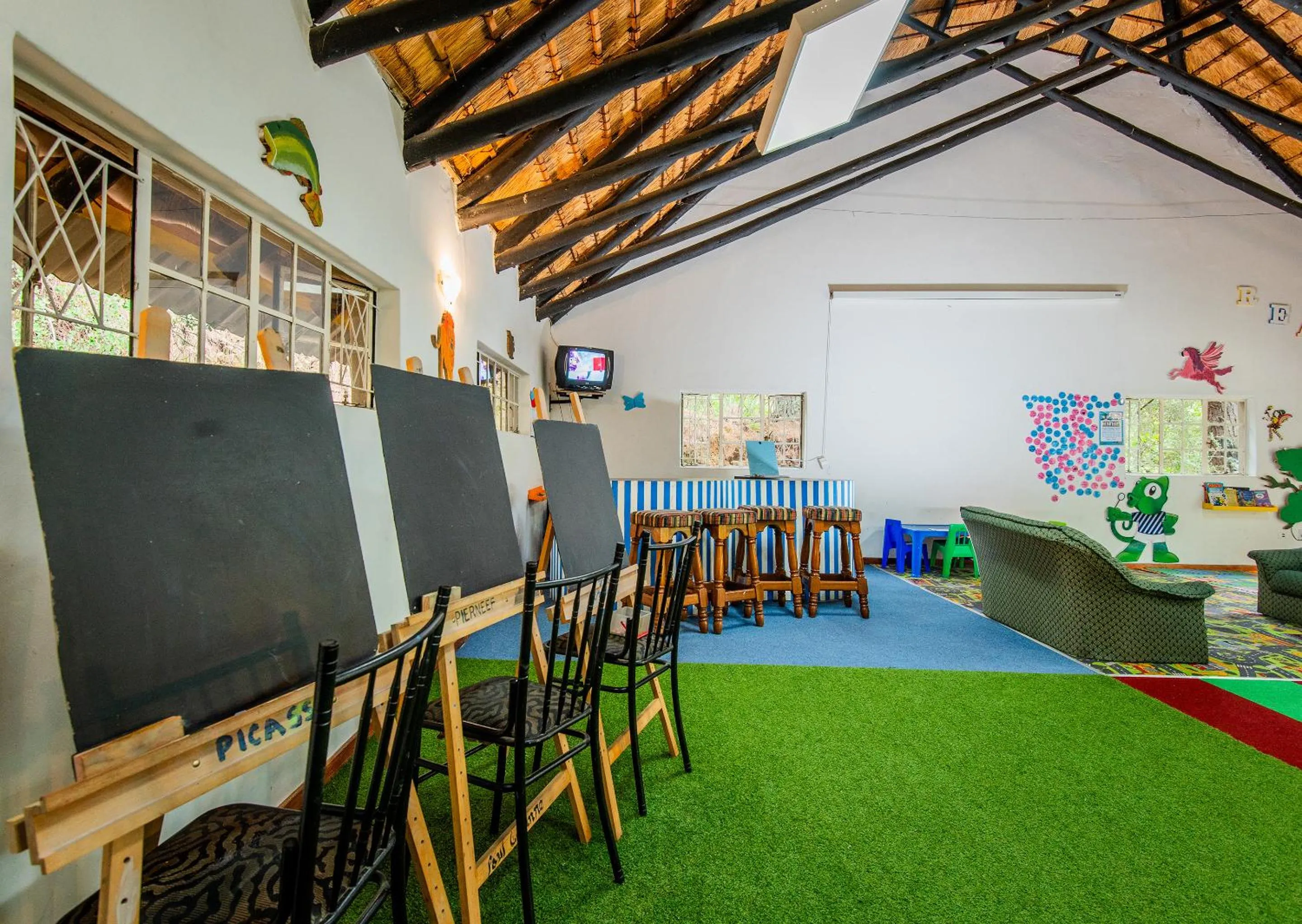 Communal lounge/ TV room in Little Switzerland Resort by Dream Resorts