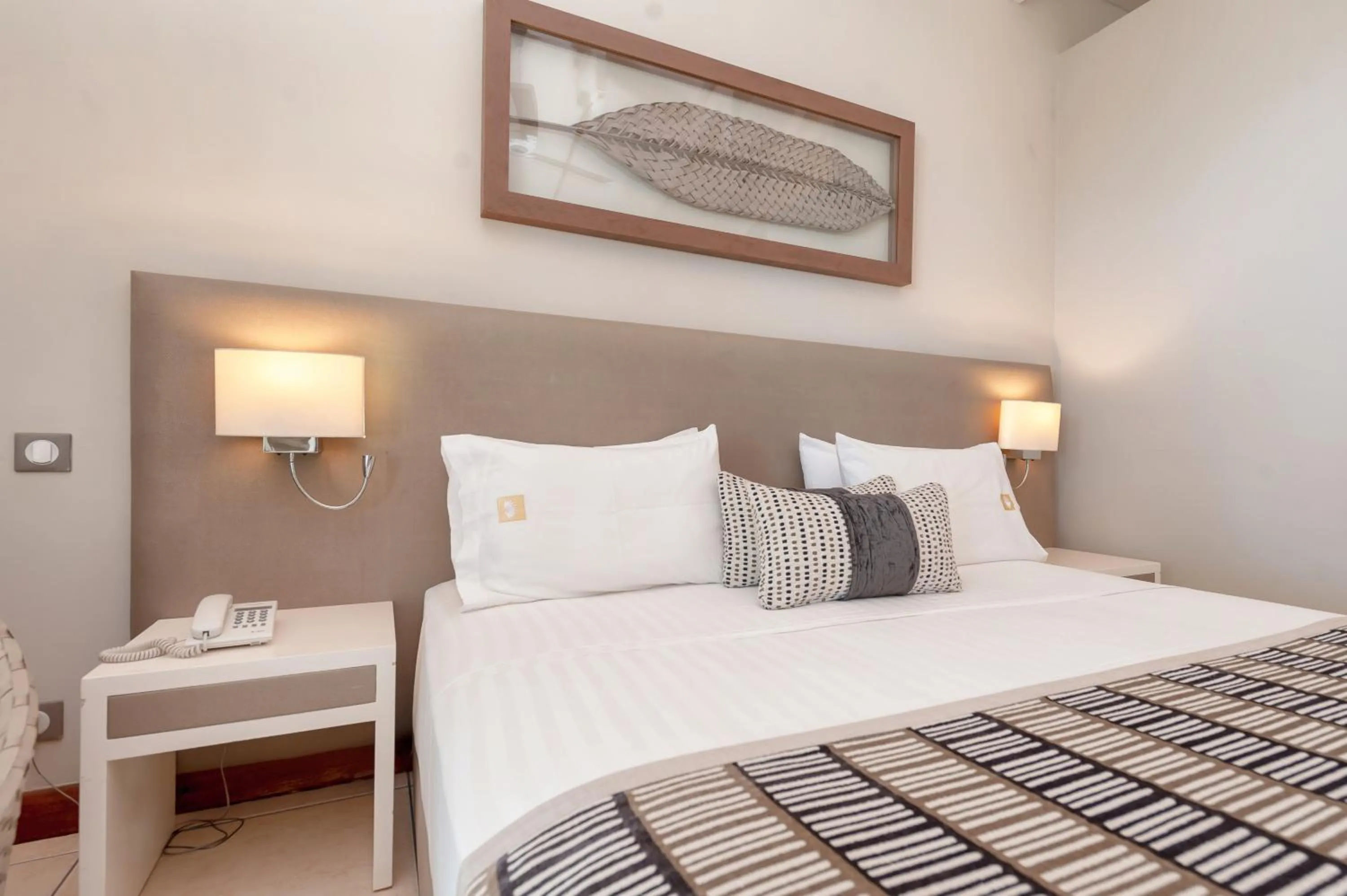 Bed in Palm Beach Resort & Spa