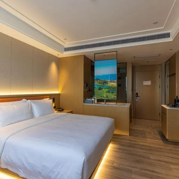 Bed in Ramada Plaza by Wyndham Ezhou Binjiang