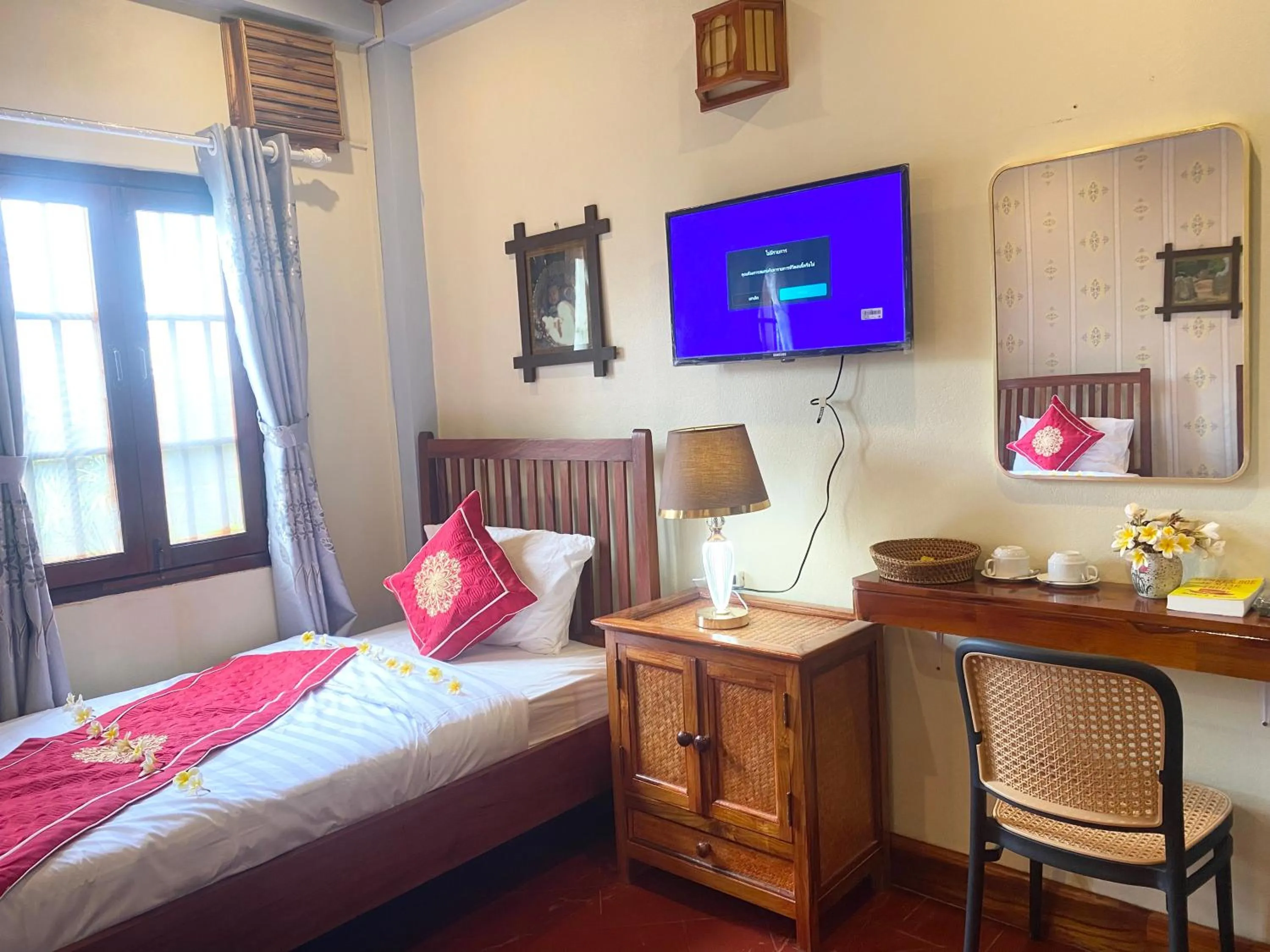 Bed in Golden Sun Hotel