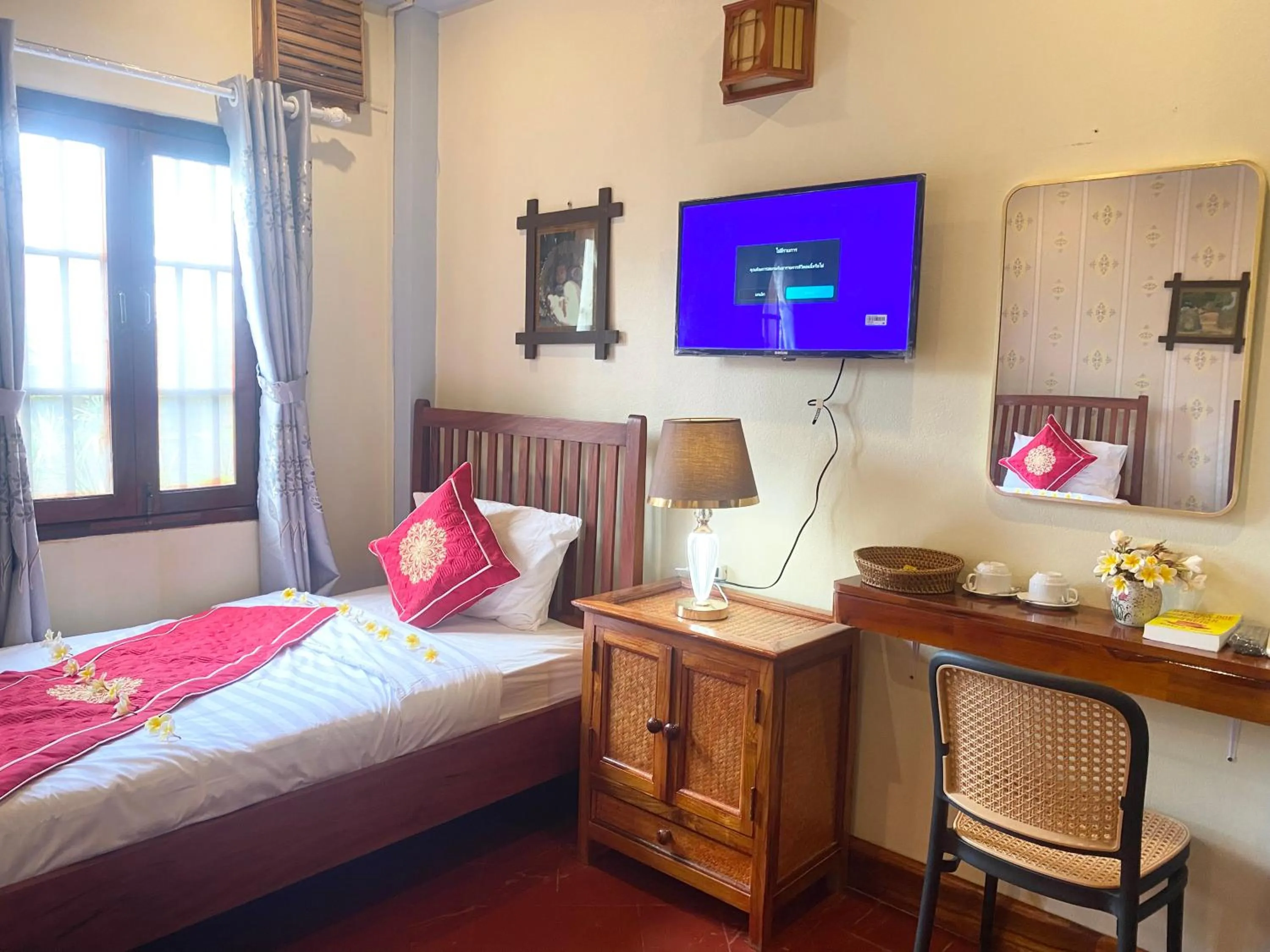 Bed in Golden Sun Hotel