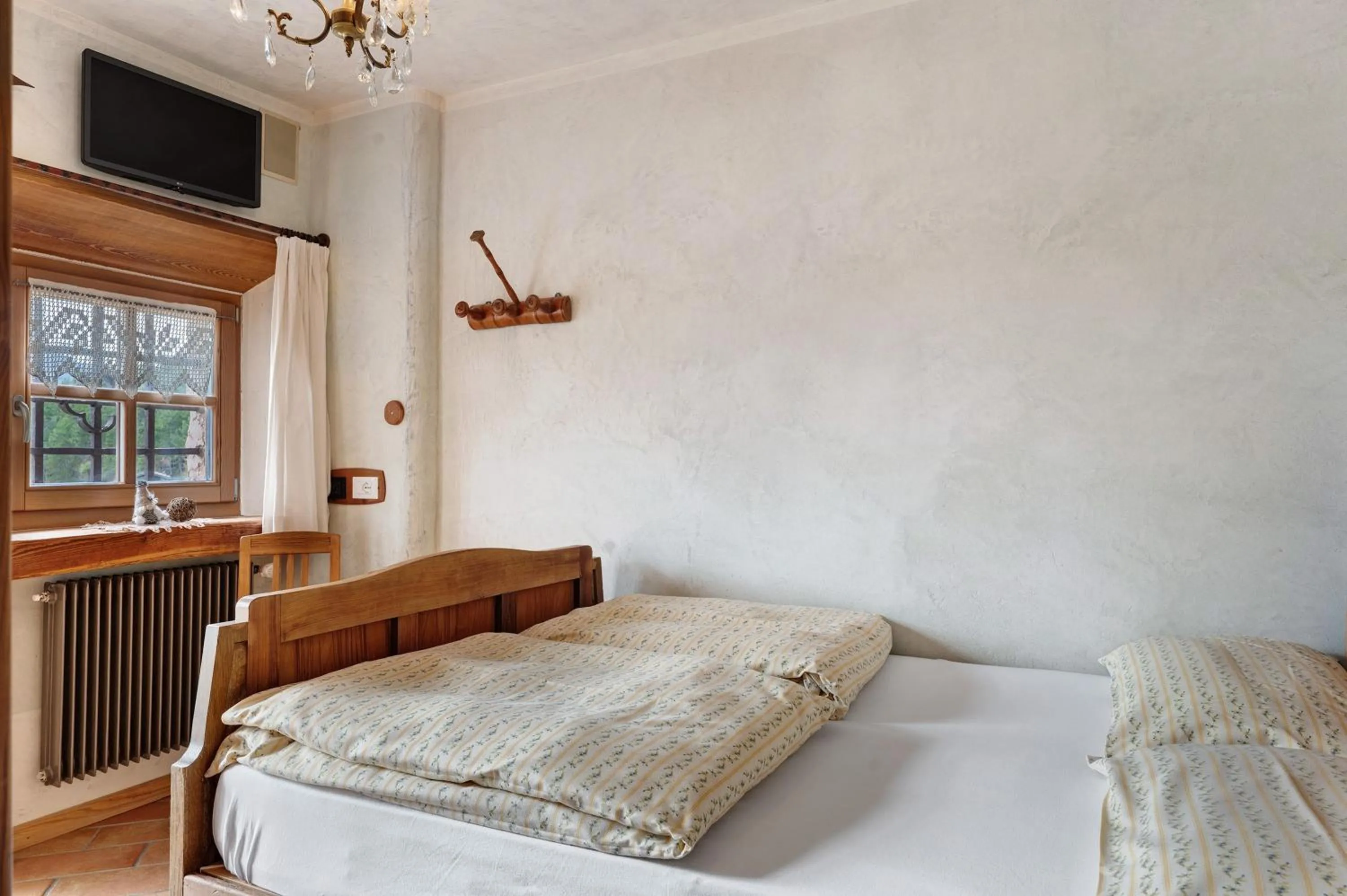 Living room, Bed in Agriturismo Alpenvidehof