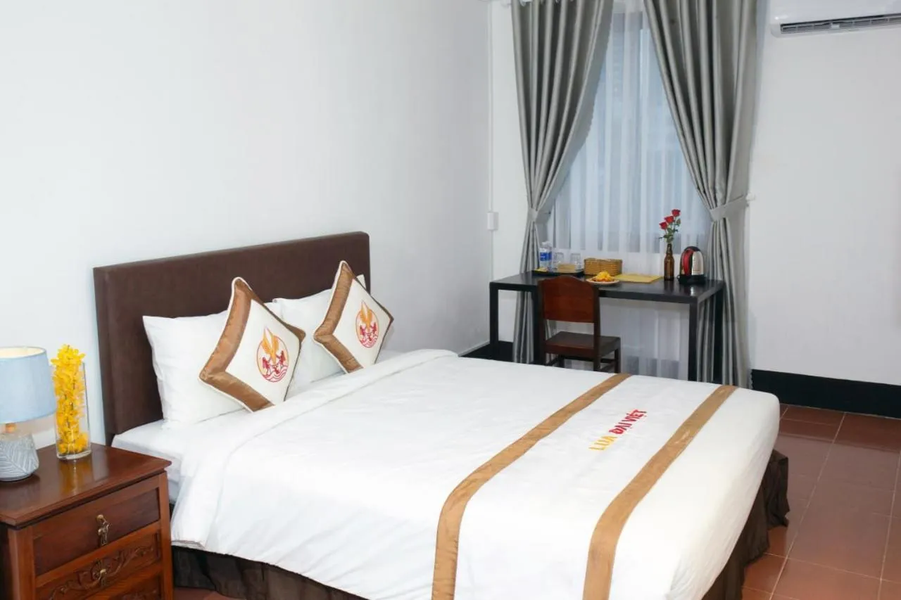 Bed in THE RICE HOTEL Nong Thon Dai Viet 131 Bui Vien