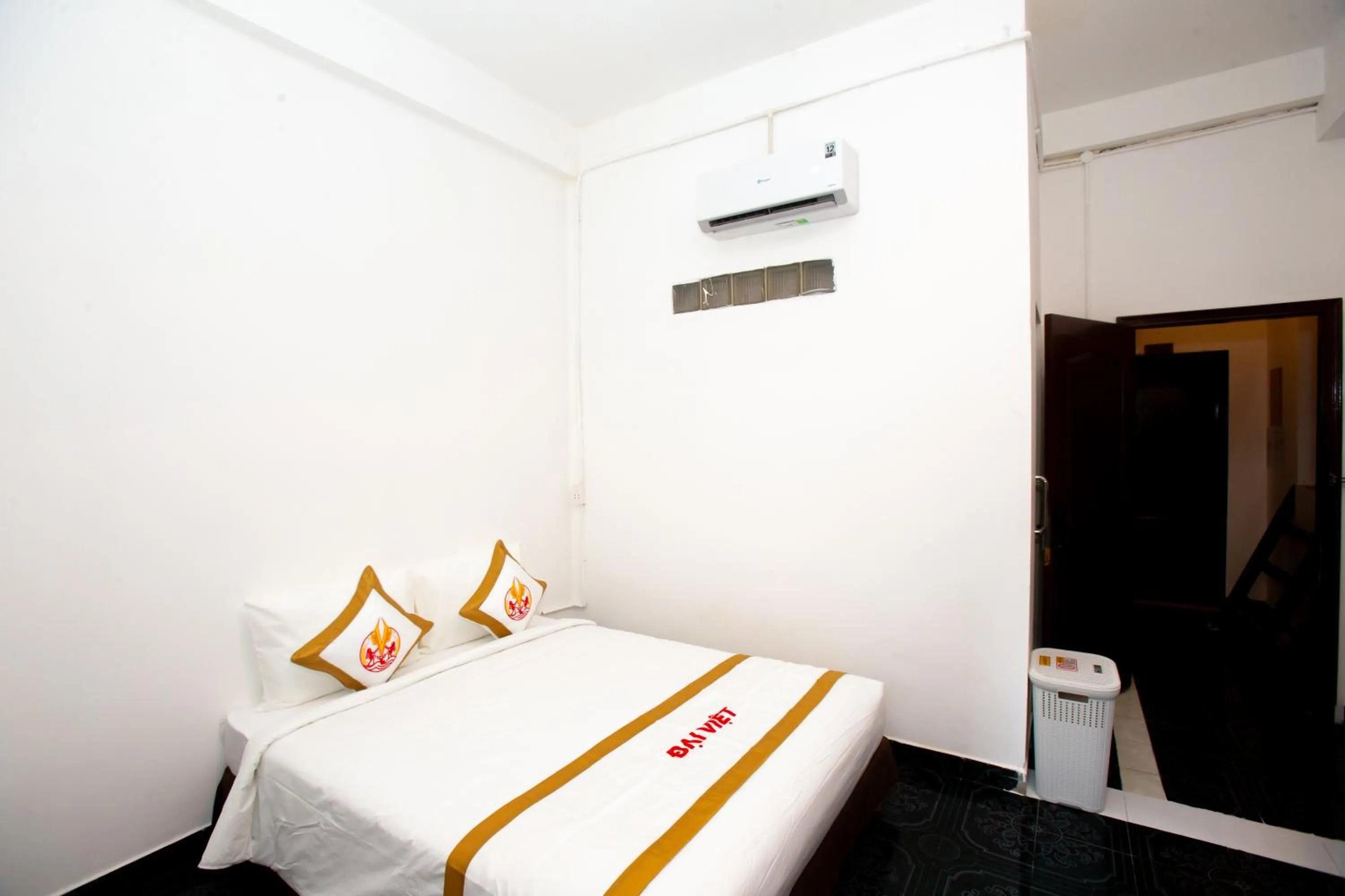 Bed in THE RICE HOTEL Nong Thon Dai Viet 131 Bui Vien