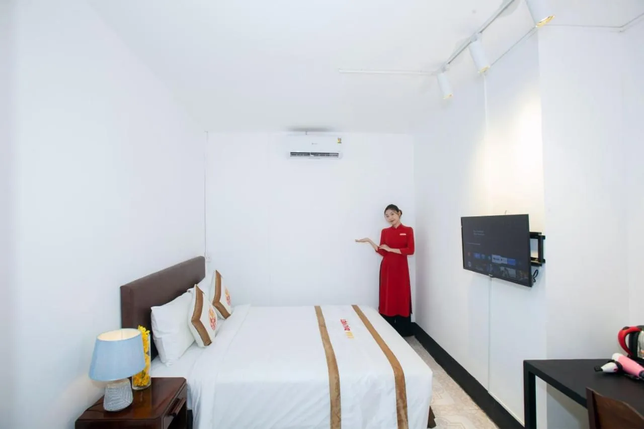 Bed in THE RICE HOTEL Nong Thon Dai Viet 131 Bui Vien