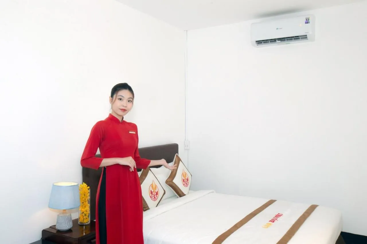 Bed in THE RICE HOTEL Nong Thon Dai Viet 131 Bui Vien