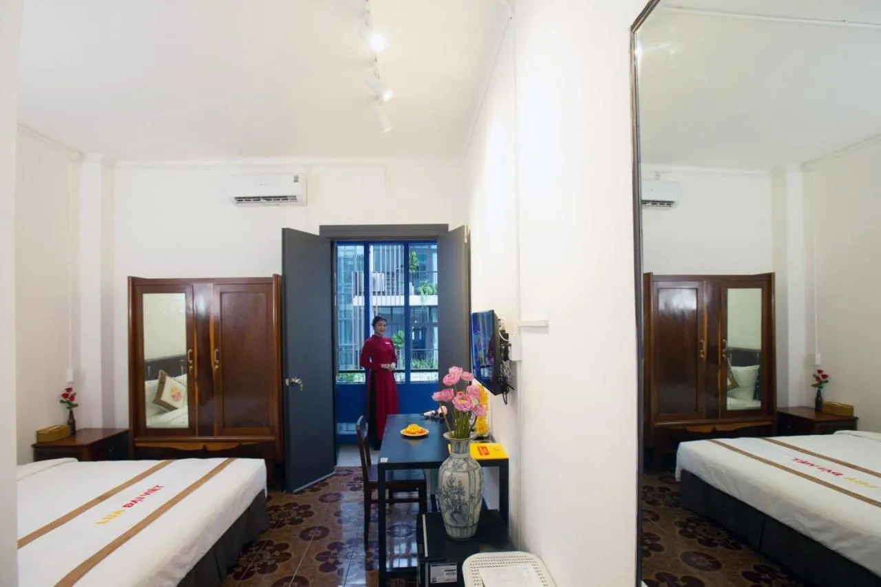 Bed in THE RICE HOTEL Nong Thon Dai Viet 131 Bui Vien