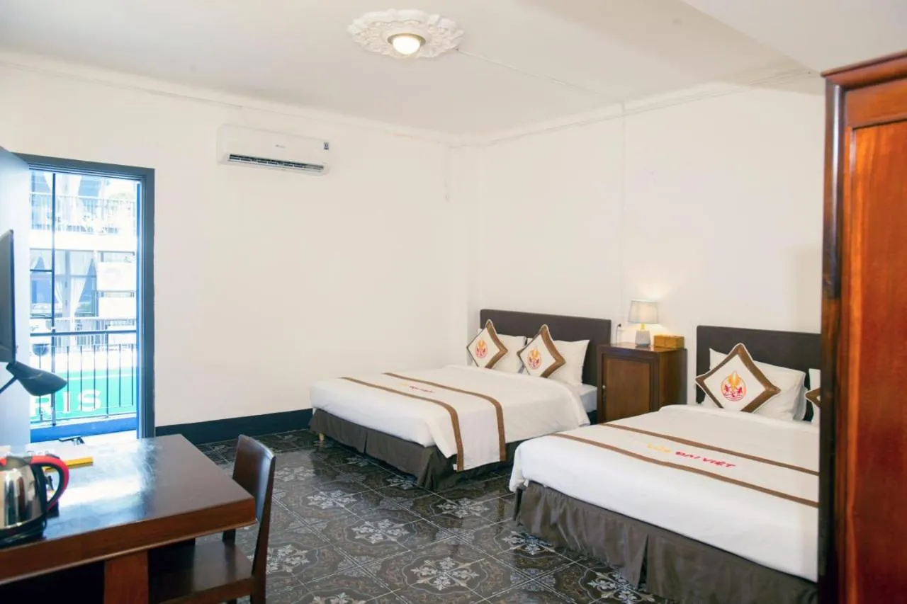 Bed in THE RICE HOTEL Nong Thon Dai Viet 131 Bui Vien