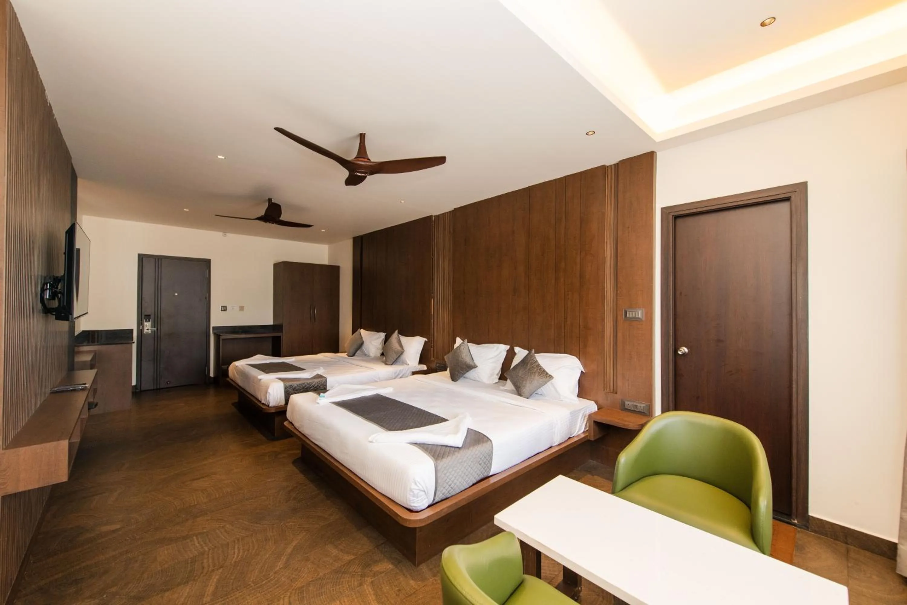 Bed in Hotel Mysore Radiance