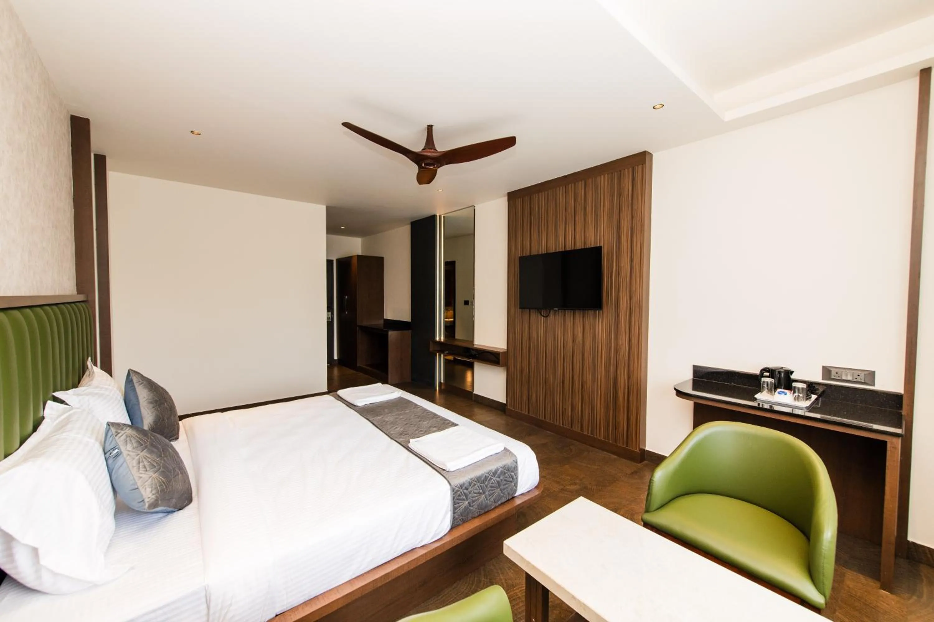 Bed in Hotel Mysore Radiance