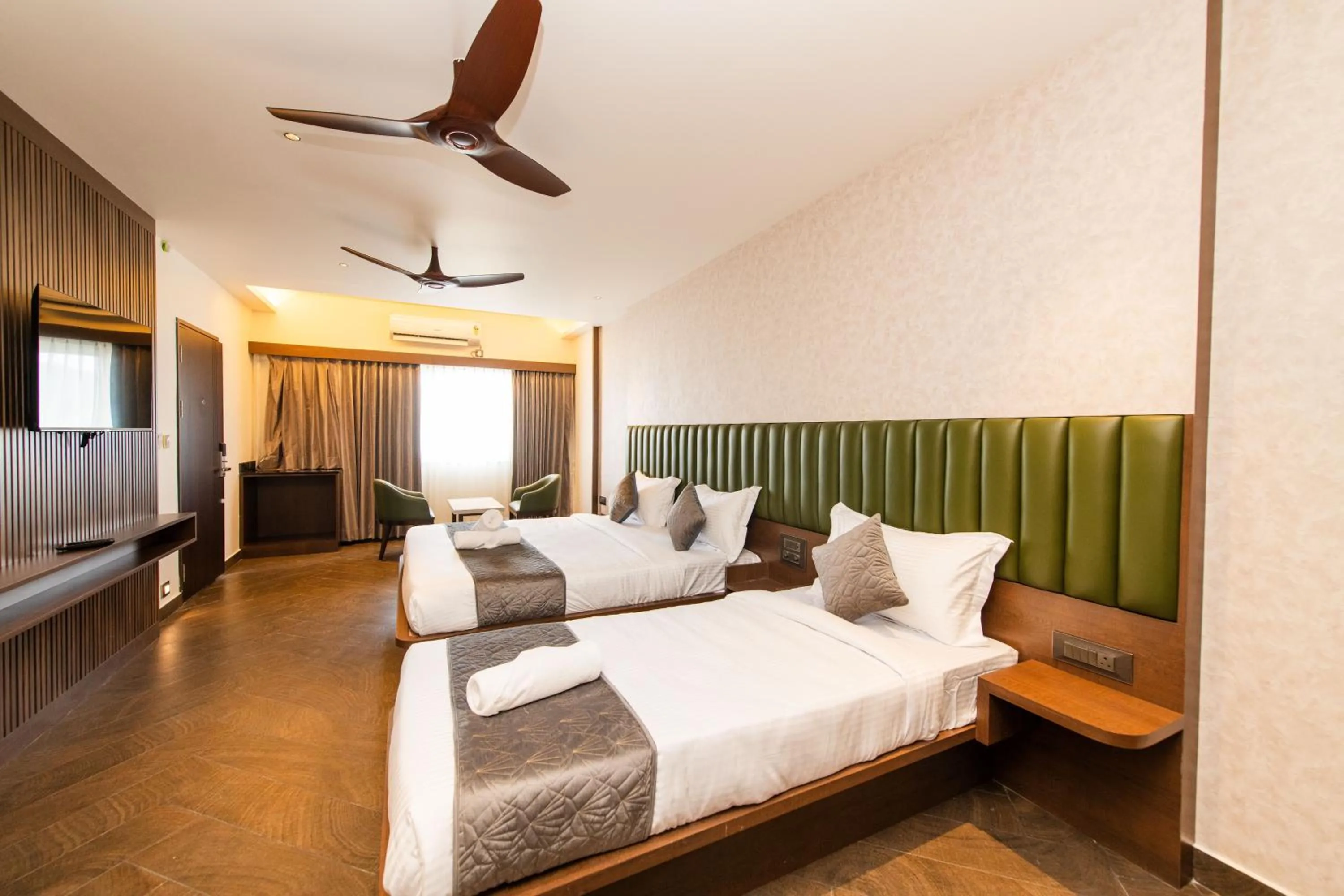 Bed in Hotel Mysore Radiance