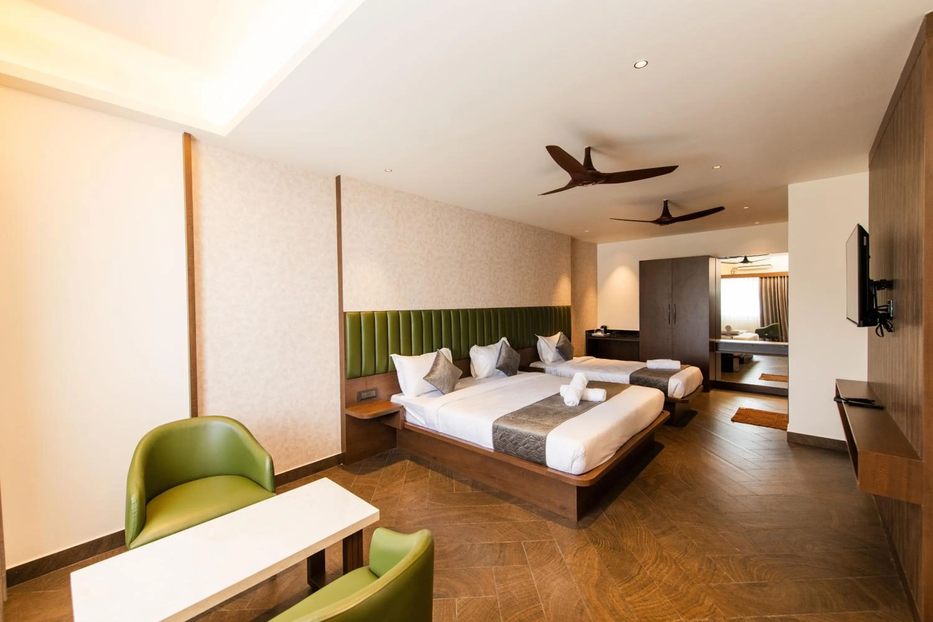 Bed in Hotel Mysore Radiance