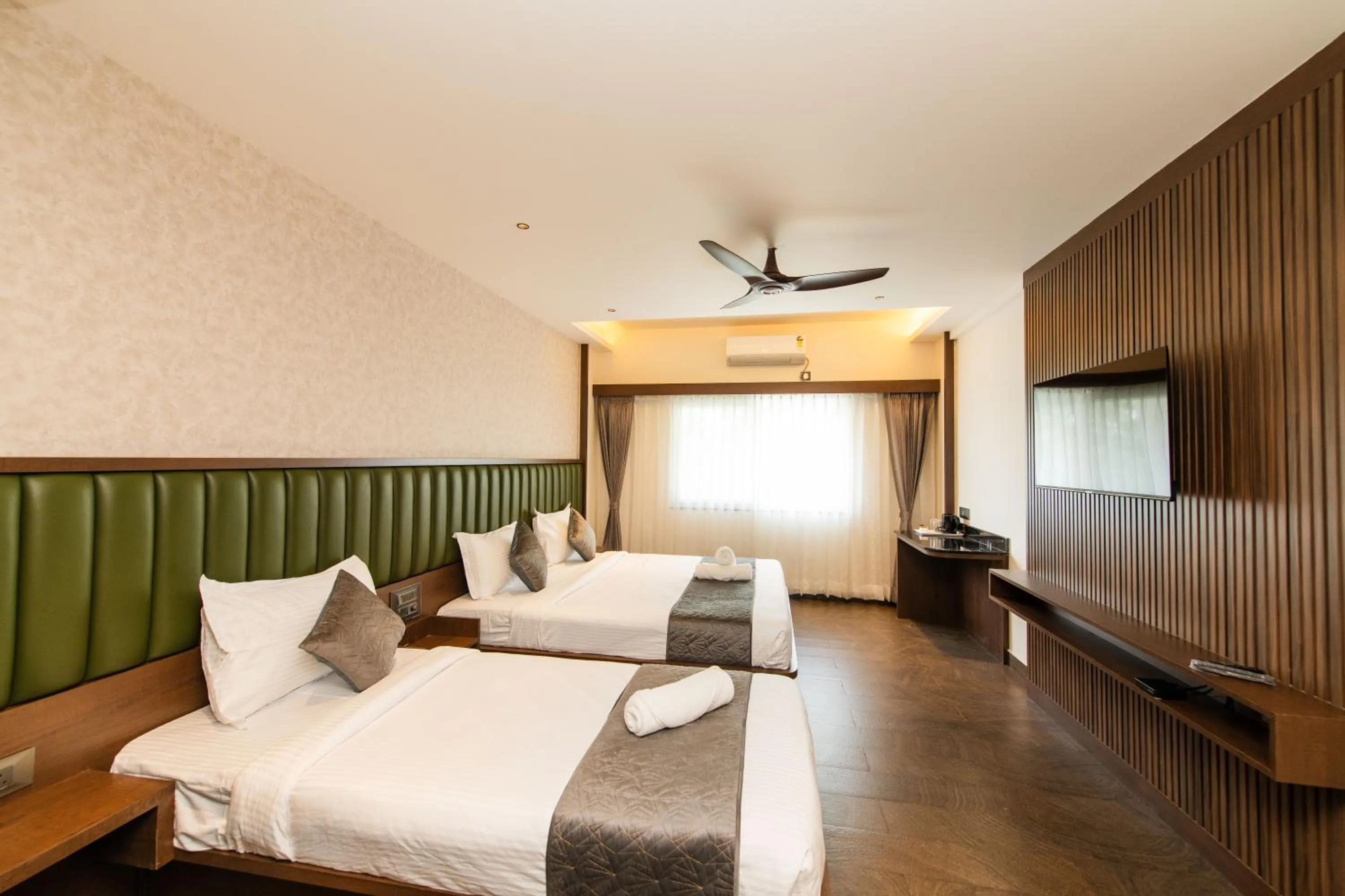 Bed in Hotel Mysore Radiance